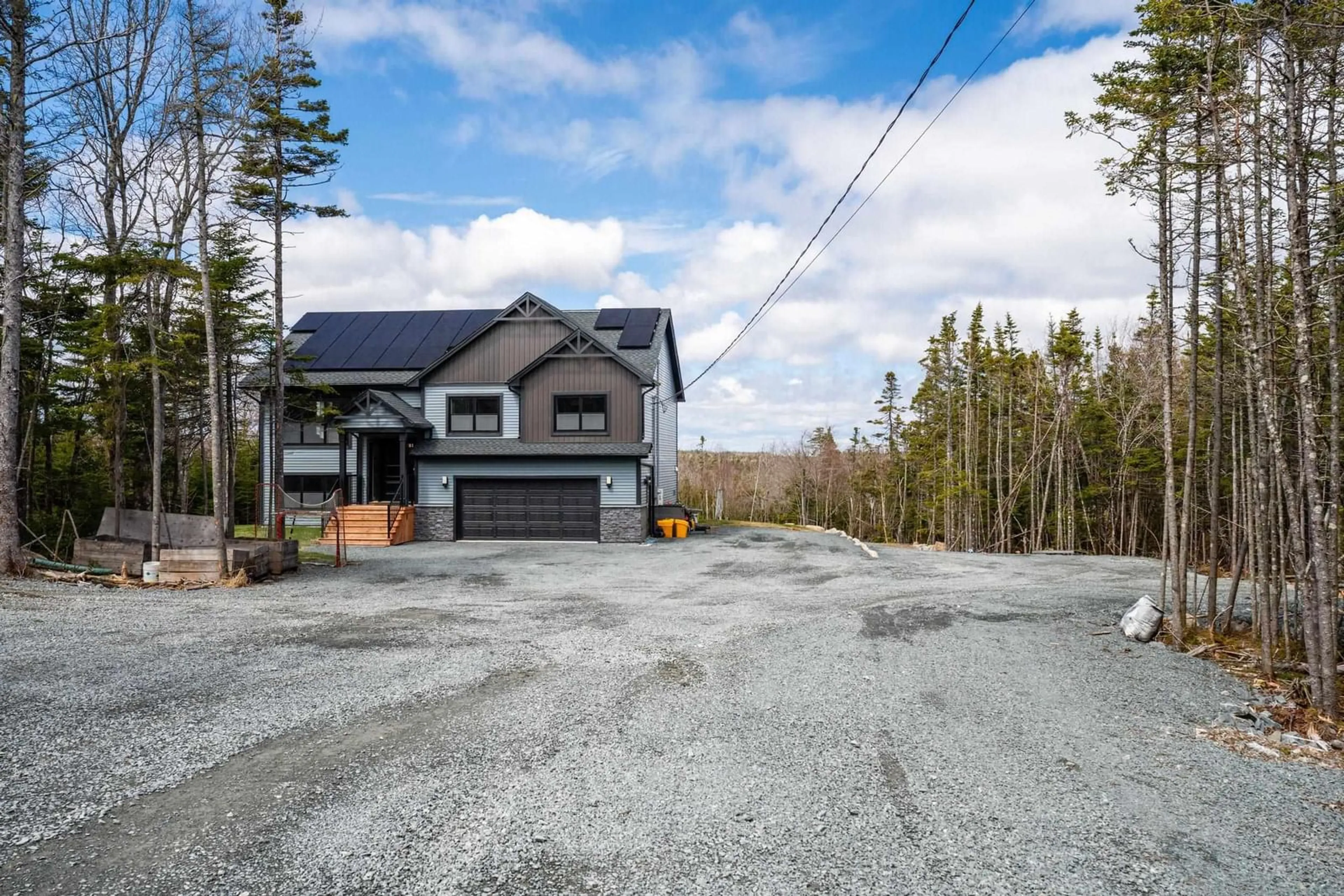 A pic from outside/outdoor area/front of a property/back of a property/a pic from drone, mountain view for 215 Portovista Dr, Portuguese Cove Nova Scotia B3V 1P3