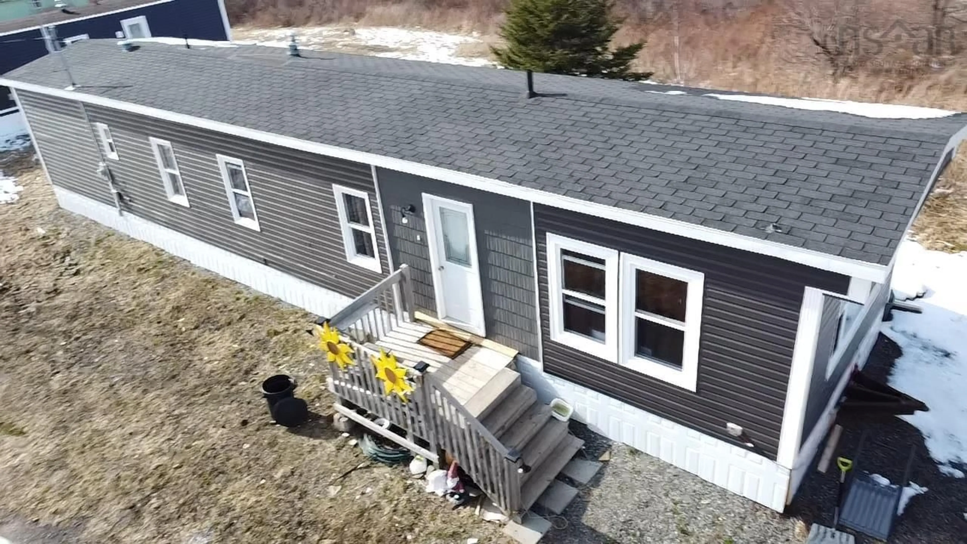 A pic from outside/outdoor area/front of a property/back of a property/a pic from drone, building for 3739 New Wareford Hwy, New Victoria Nova Scotia B1H 5B8