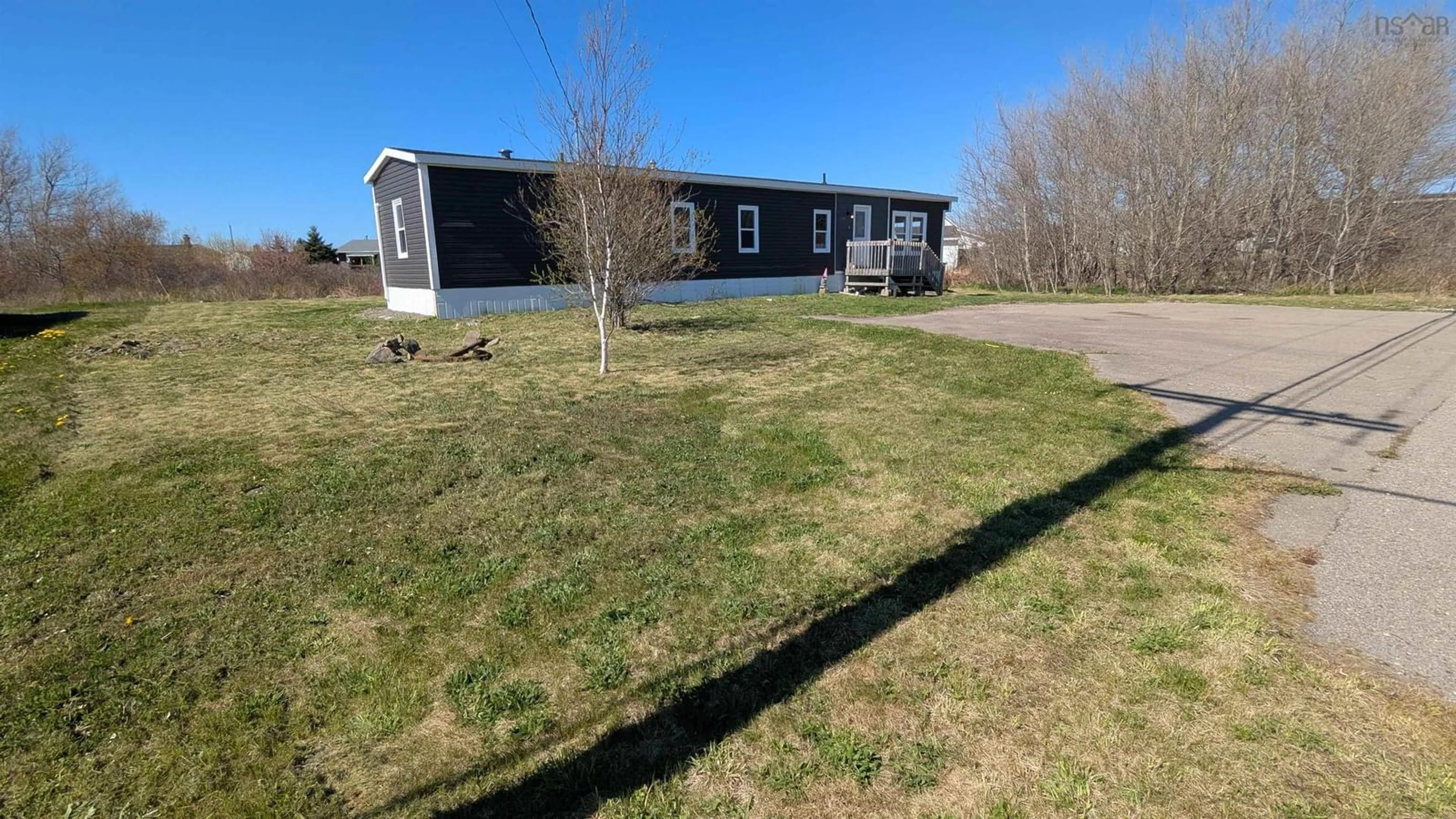 A pic from outside/outdoor area/front of a property/back of a property/a pic from drone, unknown for 3739 New Wareford Hwy, New Victoria Nova Scotia B1H 5B8