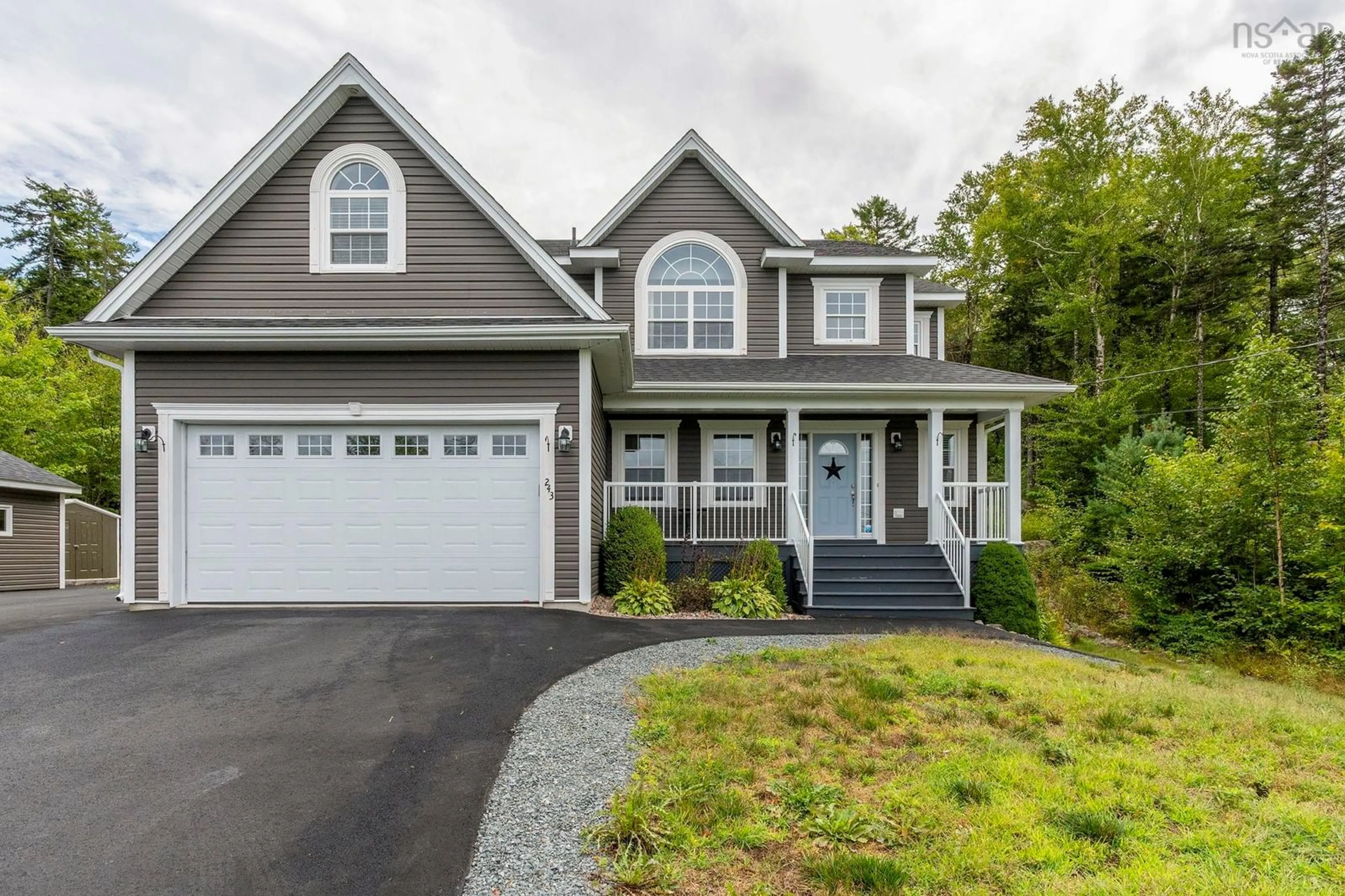 Home with vinyl exterior material, street for 243 Windbreak Run, Upper Tantallon Nova Scotia B3Z 0Z6