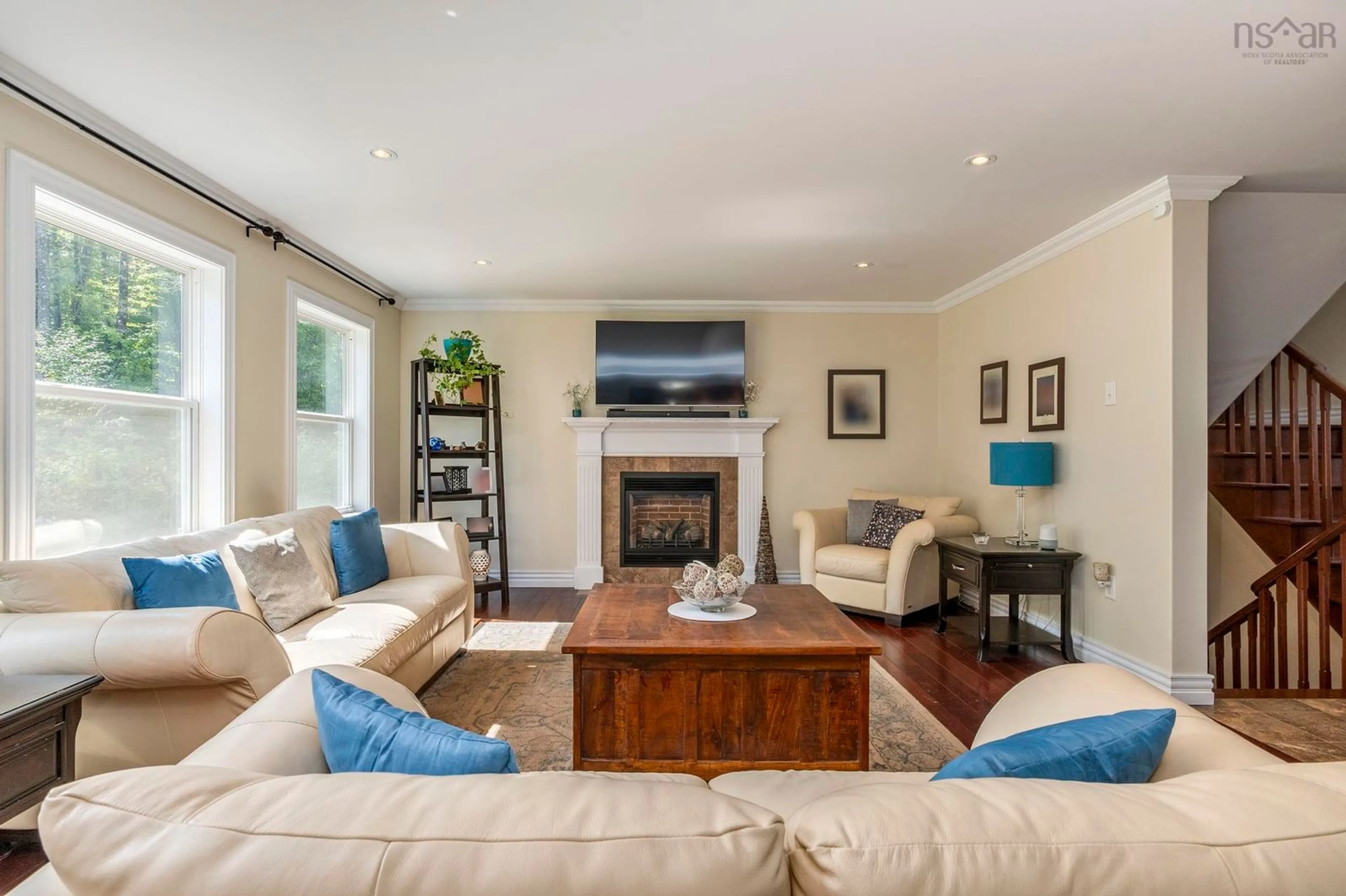 Living room with furniture, wood/laminate floor for 243 Windbreak Run, Upper Tantallon Nova Scotia B3Z 0Z6