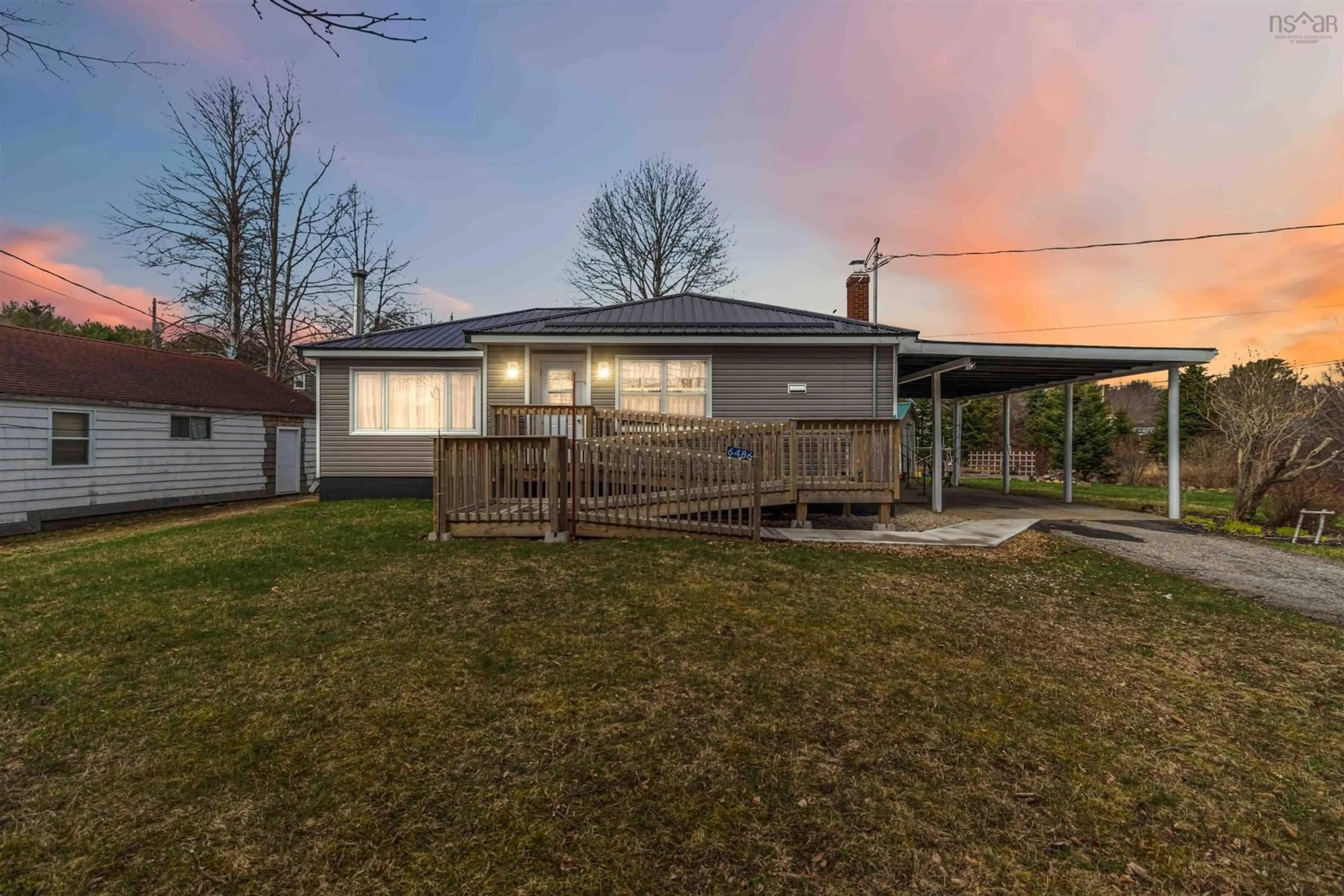 A pic from outside/outdoor area/front of a property/back of a property/a pic from drone, street for 6486 Highway 3, Western Shore Nova Scotia B0J 3M0