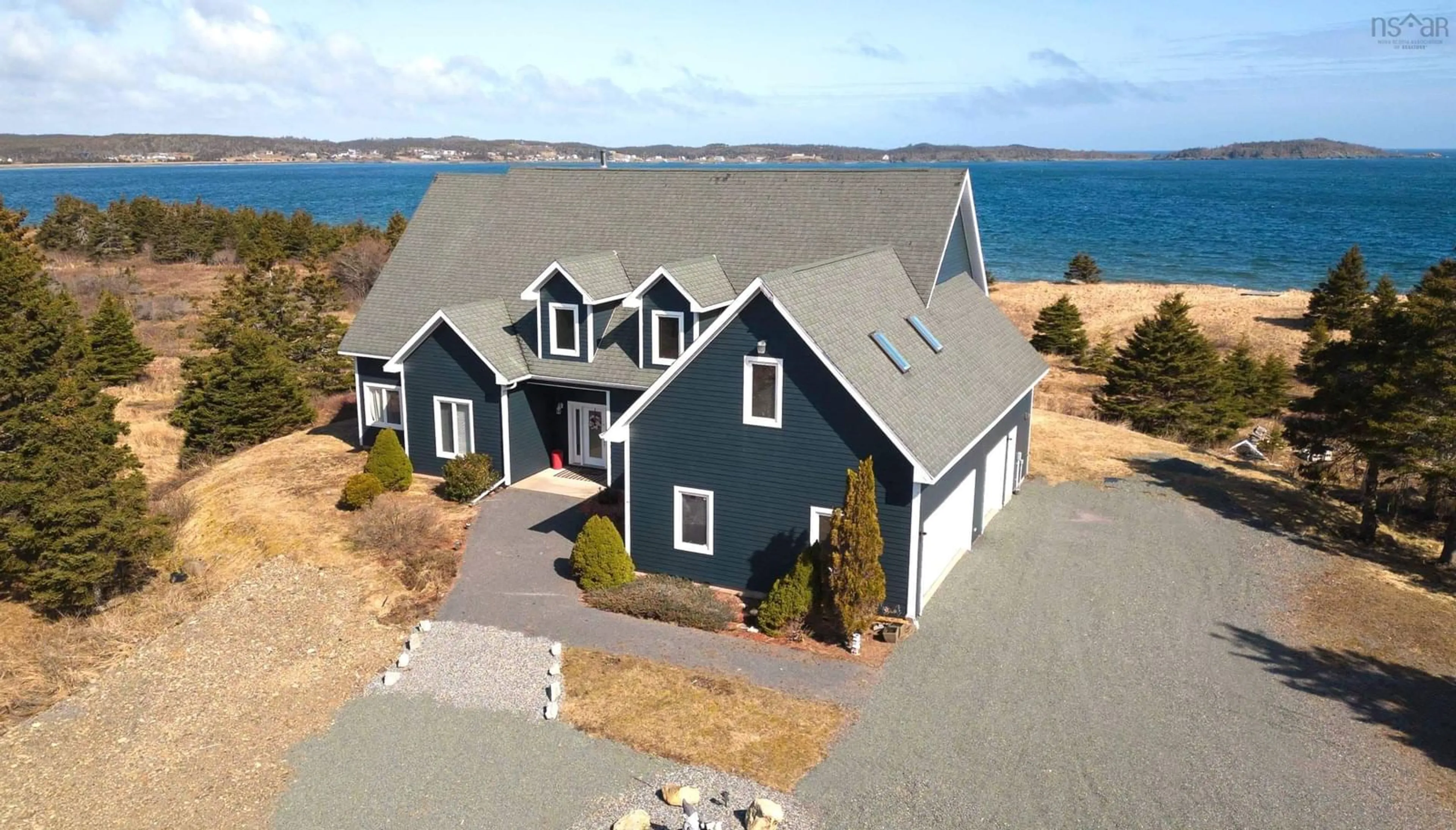 A pic from outside/outdoor area/front of a property/back of a property/a pic from drone, water/lake/river/ocean view for 2408 Louisburg Main-A-Dieu Rd, Main-À-Dieu Nova Scotia B1C 1Y9