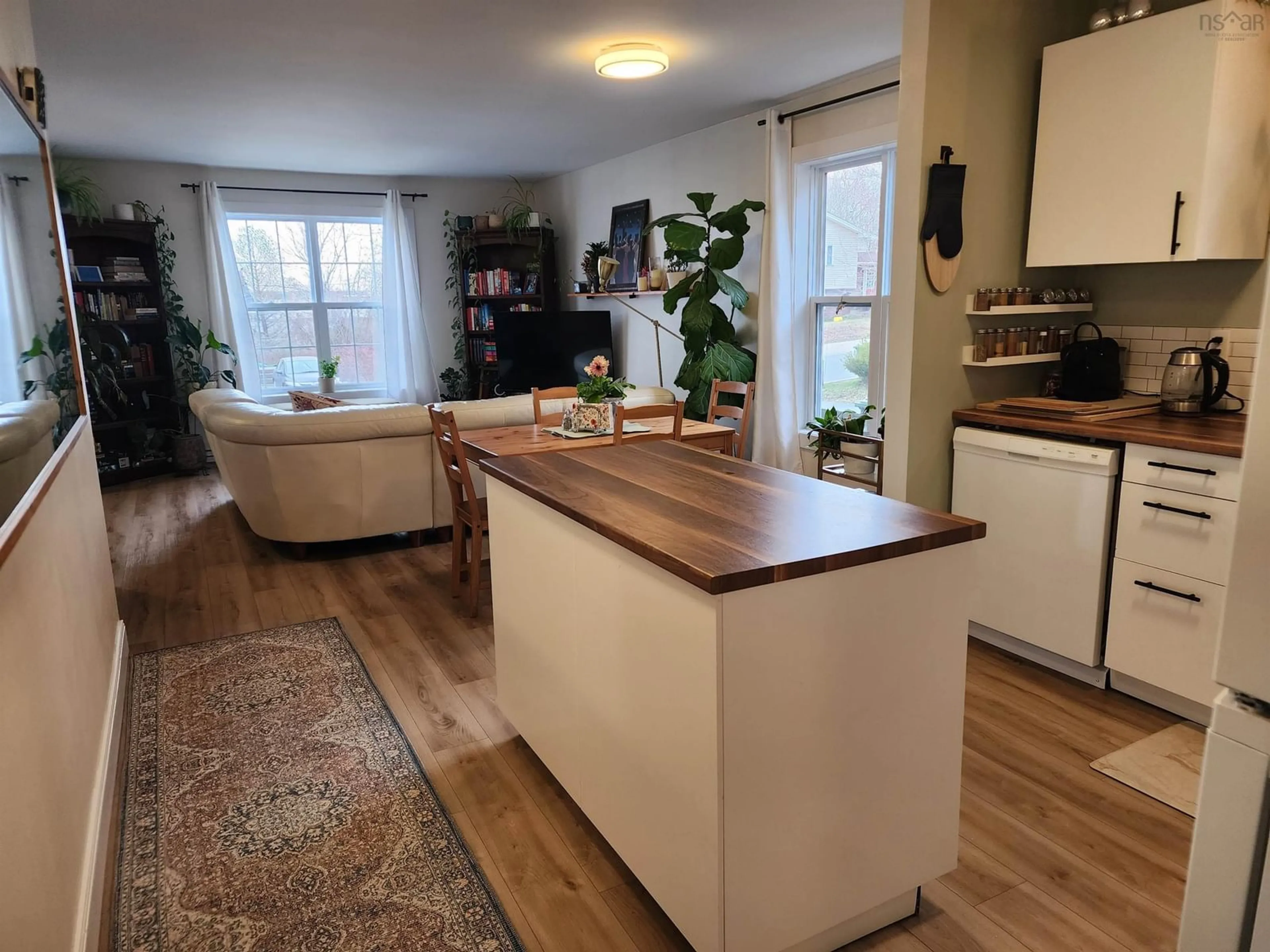 Open concept kitchen, wood/laminate floor for 389-393 Renfrew St #391, Halifax Nova Scotia B2Y 2M4