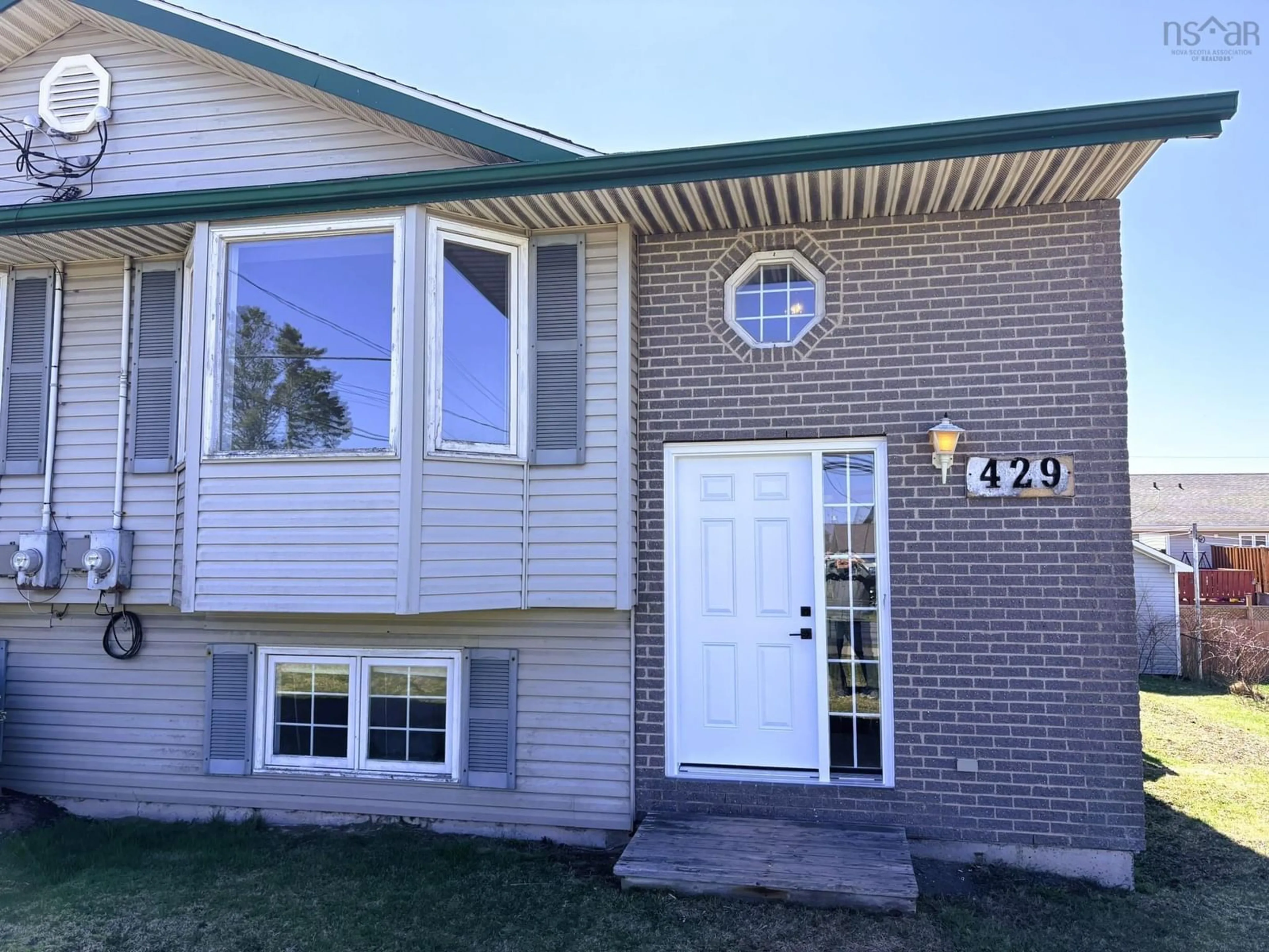 Home with vinyl exterior material, street for 429 Cow Bay Rd, Eastern Passage Nova Scotia B3G 1J4