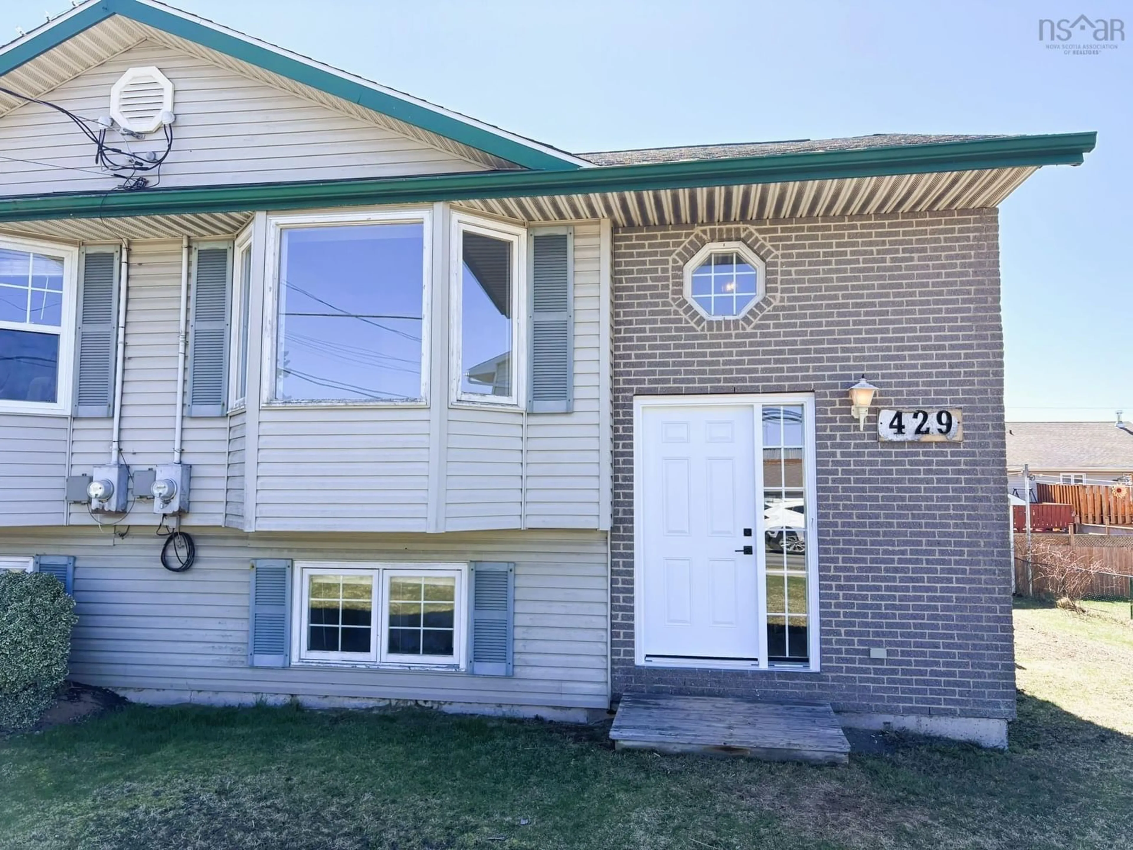 Home with vinyl exterior material, street for 429 Cow Bay Rd, Eastern Passage Nova Scotia B3G 1J4