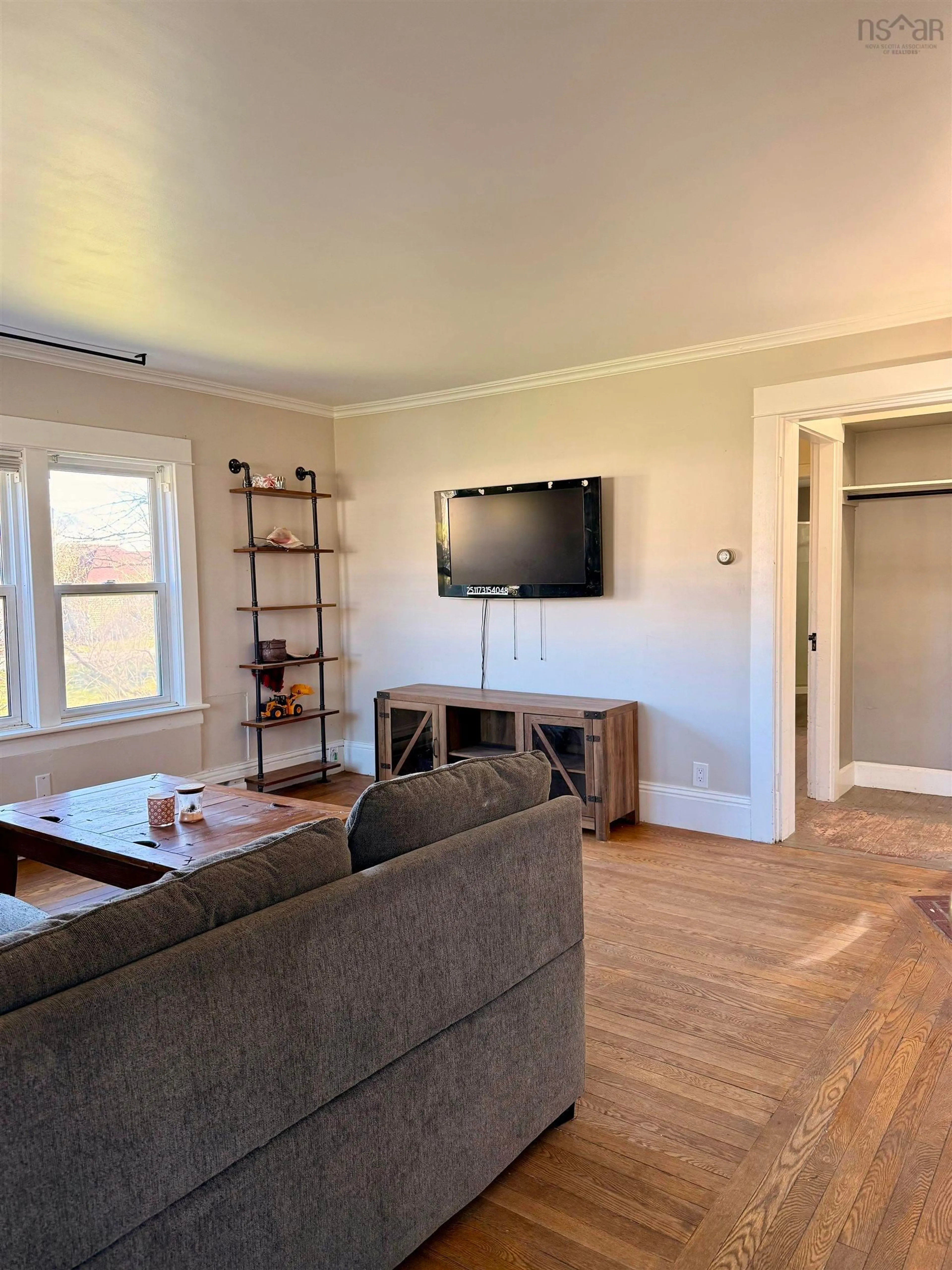 Living room with furniture, wood/laminate floor for 225 Water Street, Shelburne Nova Scotia B0T 1W0