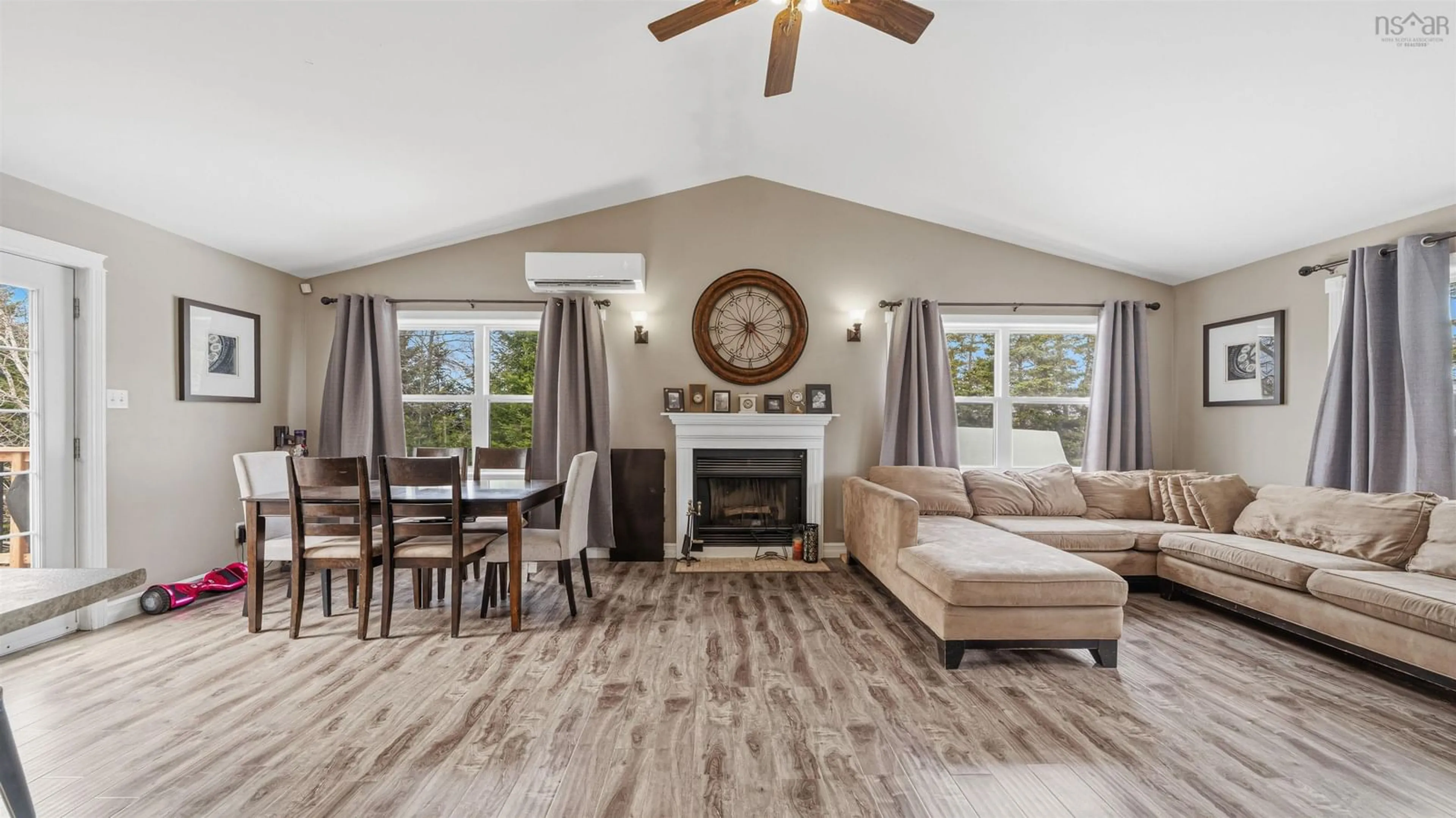 Living room with furniture, wood/laminate floor for 206 Les Collins Ave, West Chezzetcook Nova Scotia B0J 2L0