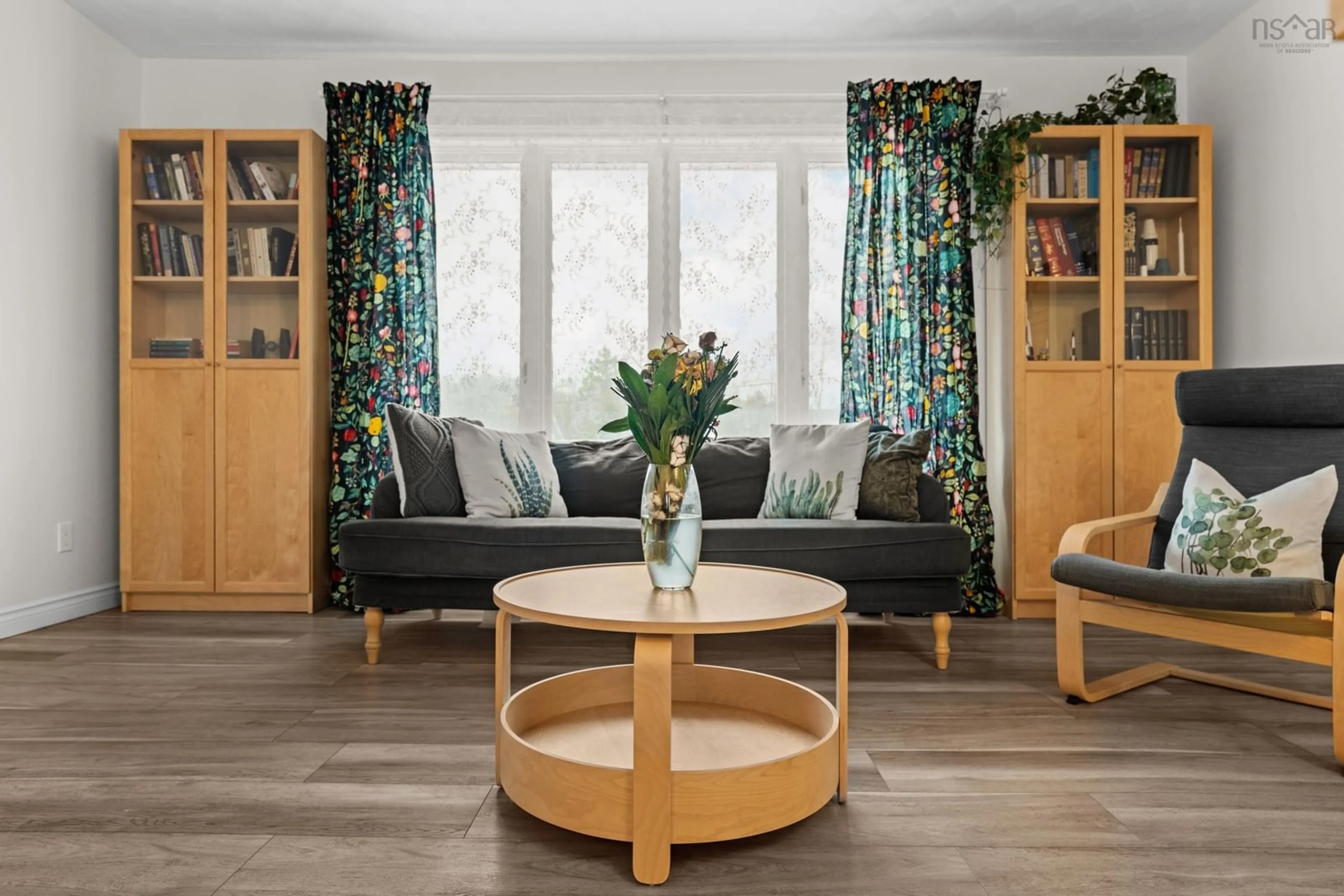 Living room with furniture, wood/laminate floor for 162 Sunnyvale Cres, Lower Sackville Nova Scotia B4E 2S5