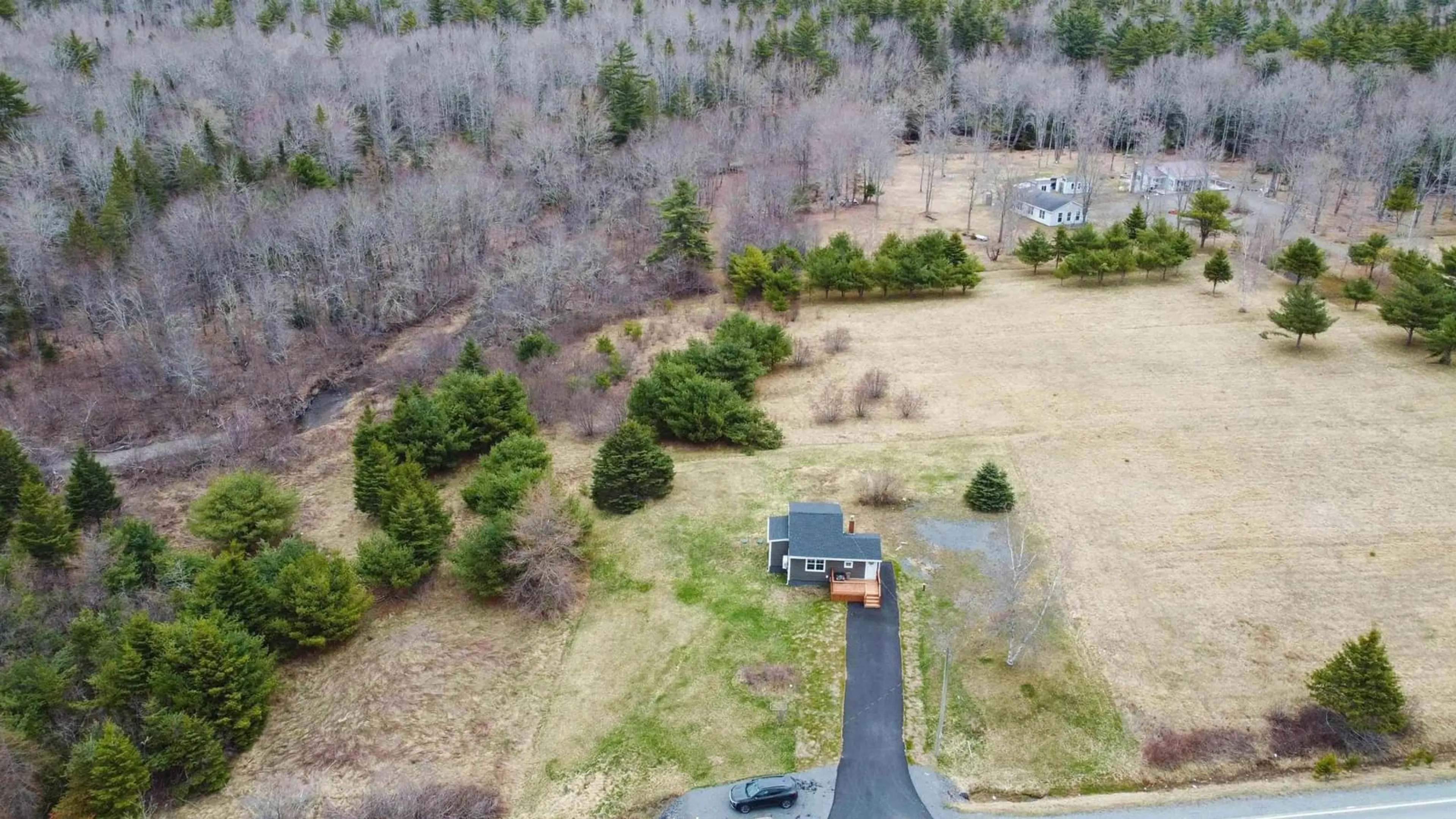 A pic from outside/outdoor area/front of a property/back of a property/a pic from drone, forest/trees view for 1039 Highway 14, Greenfield Nova Scotia B0N 2T0