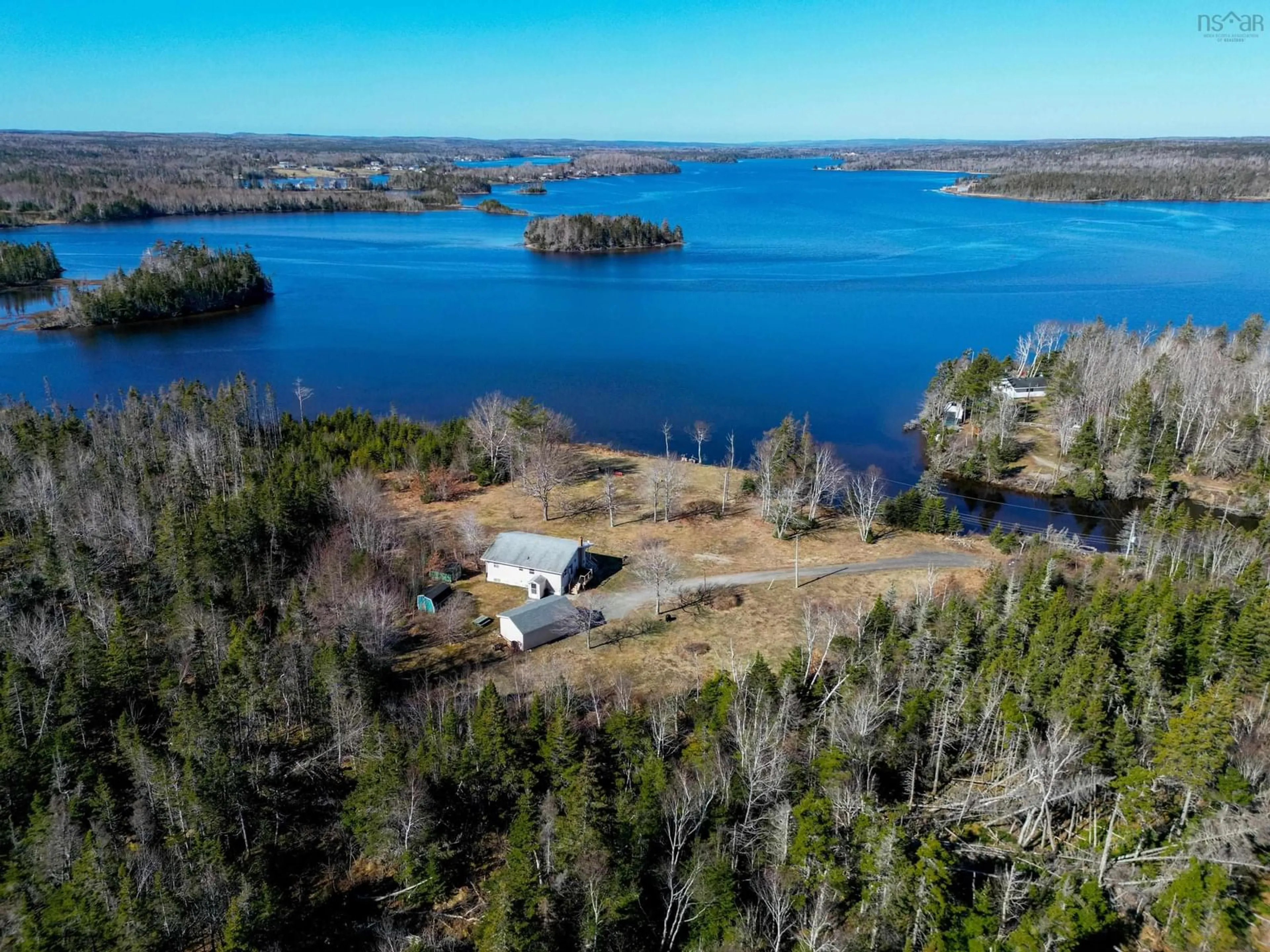 A pic from outside/outdoor area/front of a property/back of a property/a pic from drone, water/lake/river/ocean view for 6279 Hornes Rd, Mira Gut Nova Scotia B1K 2Y9