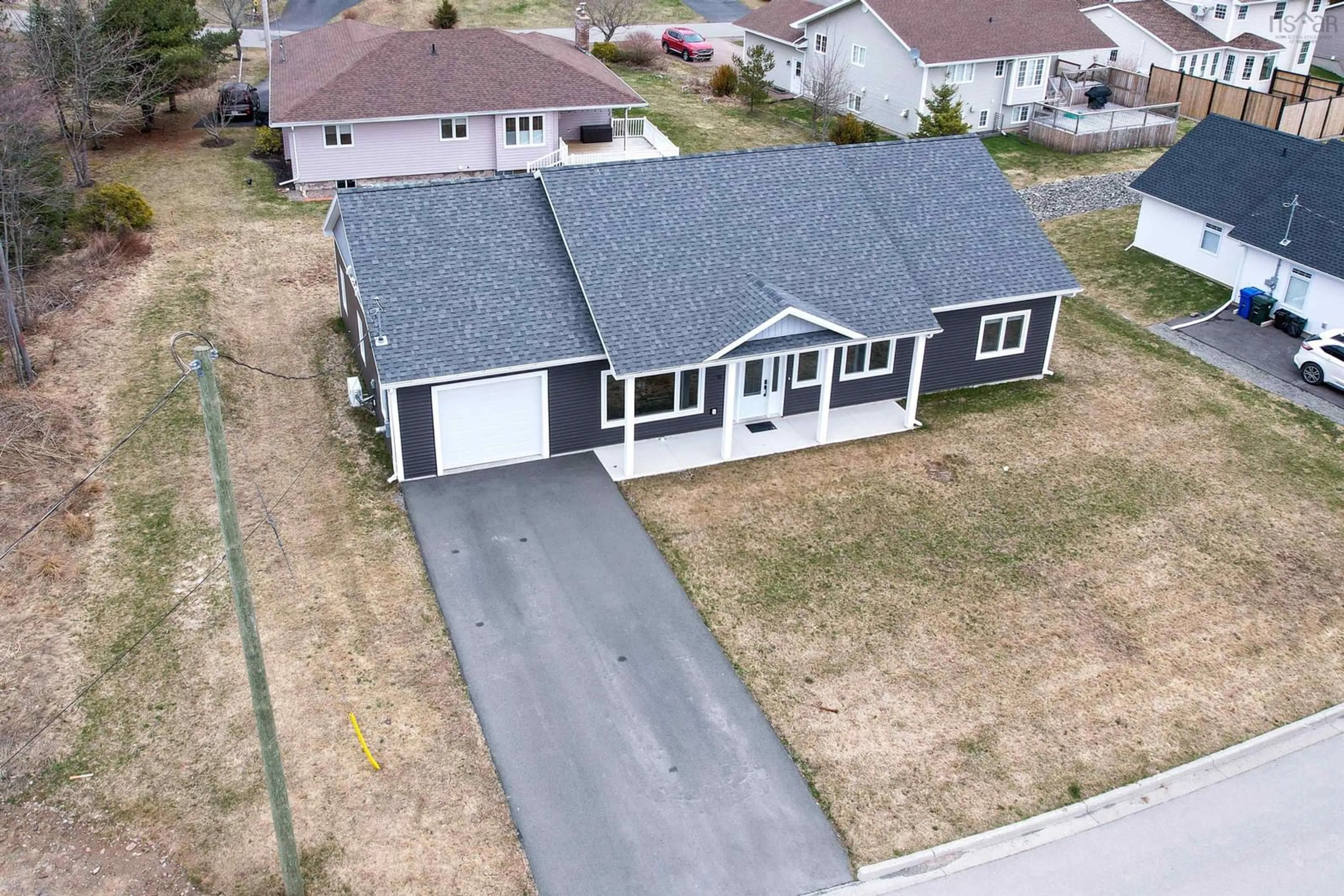 A pic from outside/outdoor area/front of a property/back of a property/a pic from drone, street for 91 Ridgevale Dr, Westmount Nova Scotia B1R 0C2