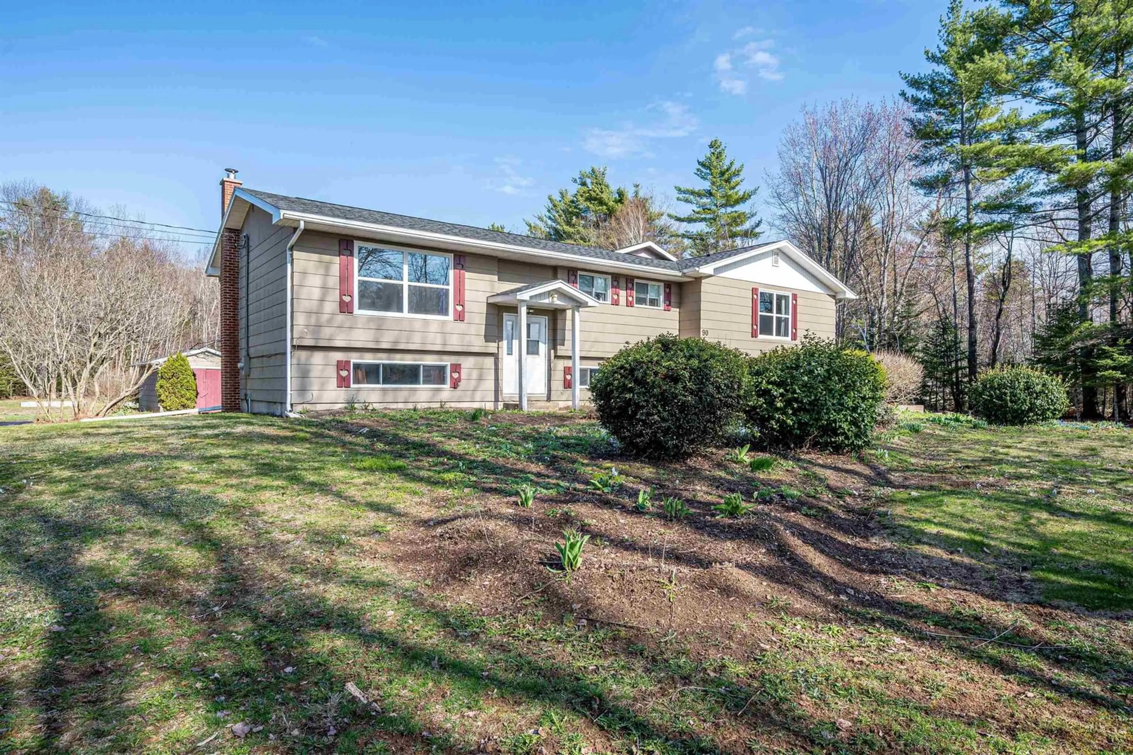 Home with vinyl exterior material, street for 90 Parrish Rd, Woodville Nova Scotia B0P 1G0