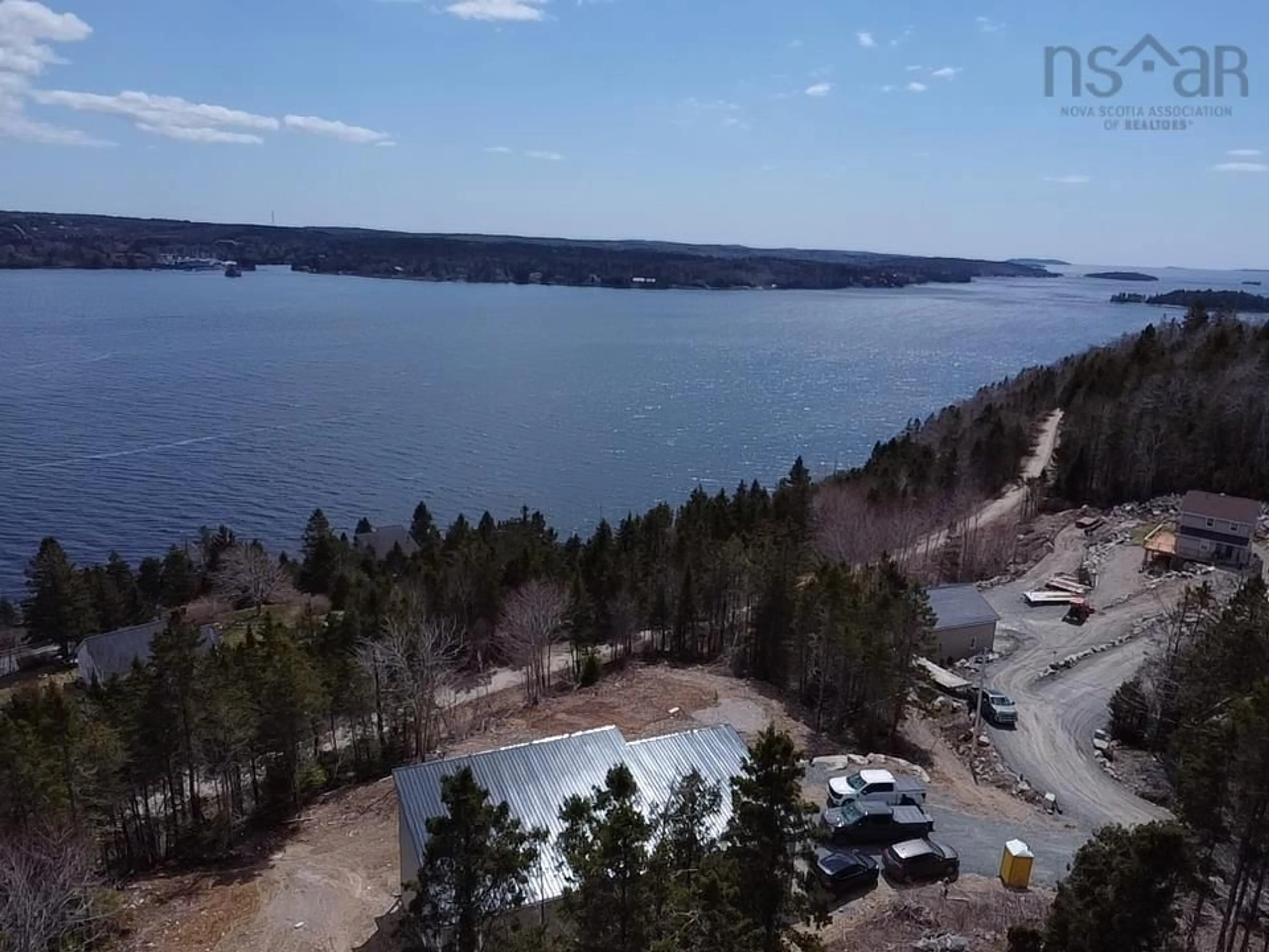 A pic from outside/outdoor area/front of a property/back of a property/a pic from drone, water/lake/river/ocean view for 28 Marinavista Lane, Boutiliers Point Nova Scotia B3Z 0W9
