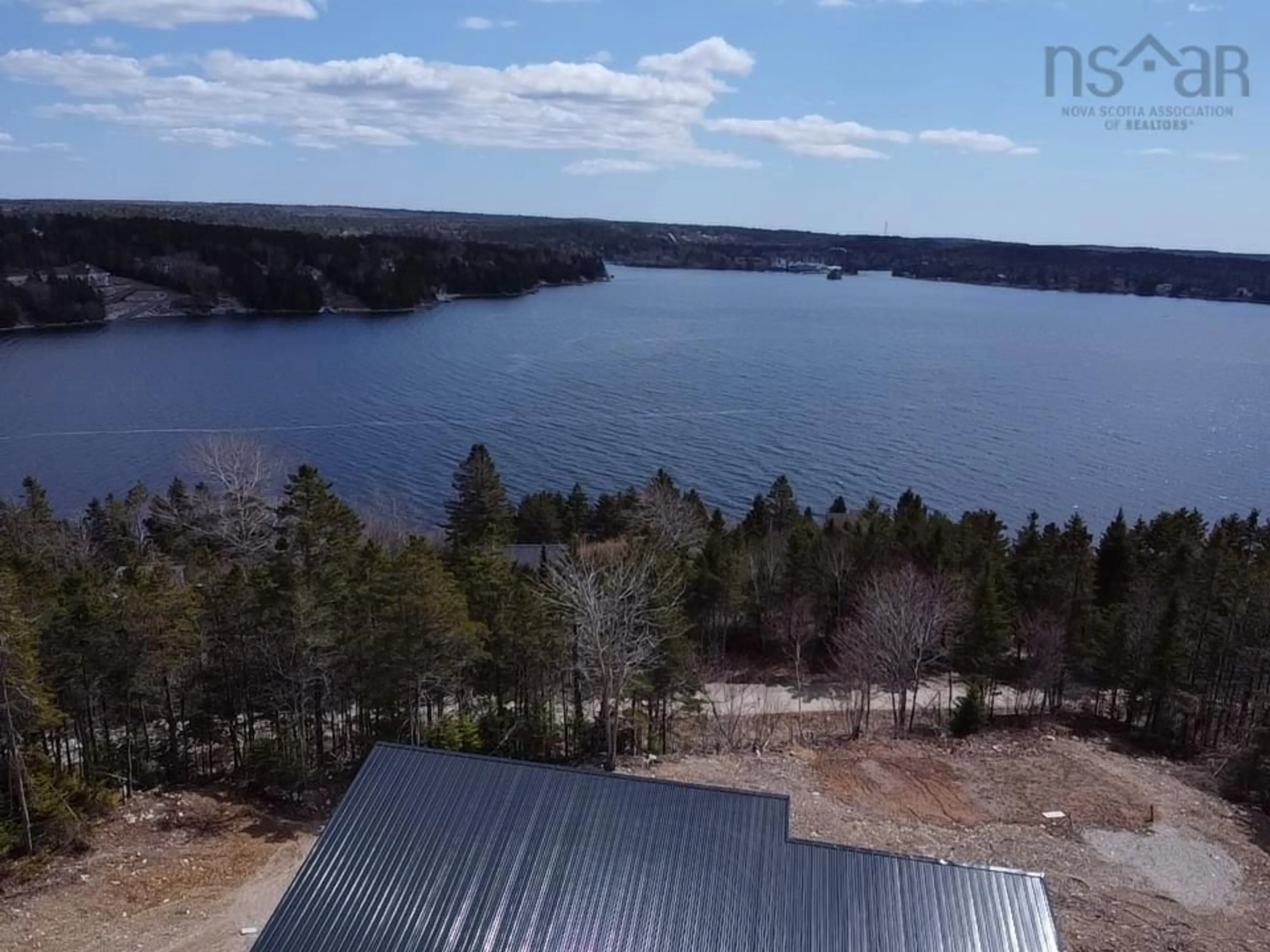 A pic from outside/outdoor area/front of a property/back of a property/a pic from drone, water/lake/river/ocean view for 28 Marinavista Lane, Boutiliers Point Nova Scotia B3Z 0W9