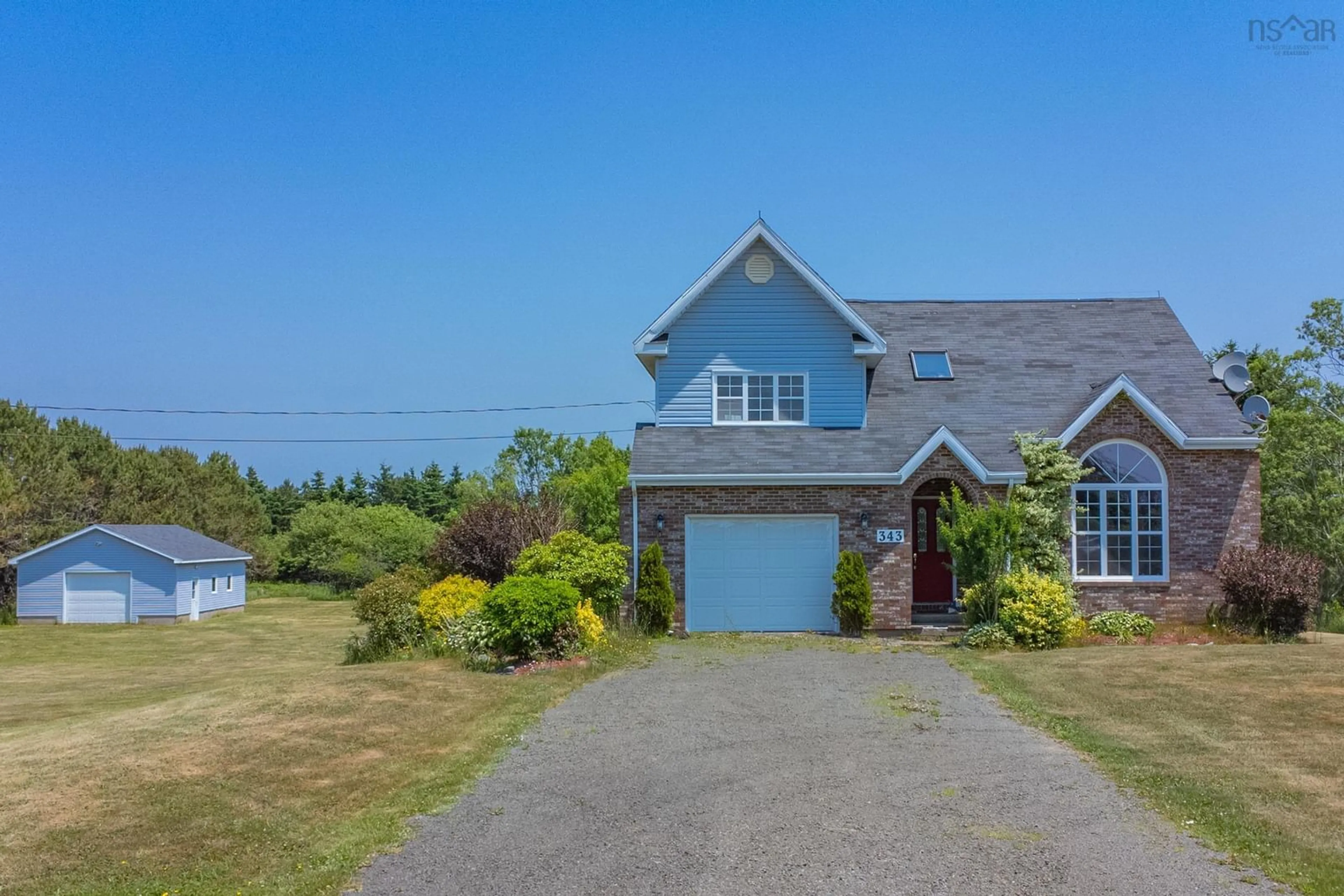 A pic from outside/outdoor area/front of a property/back of a property/a pic from drone, water/lake/river/ocean view for 343 Peter Dugas Rd, Meteghan Nova Scotia B0W 2J0