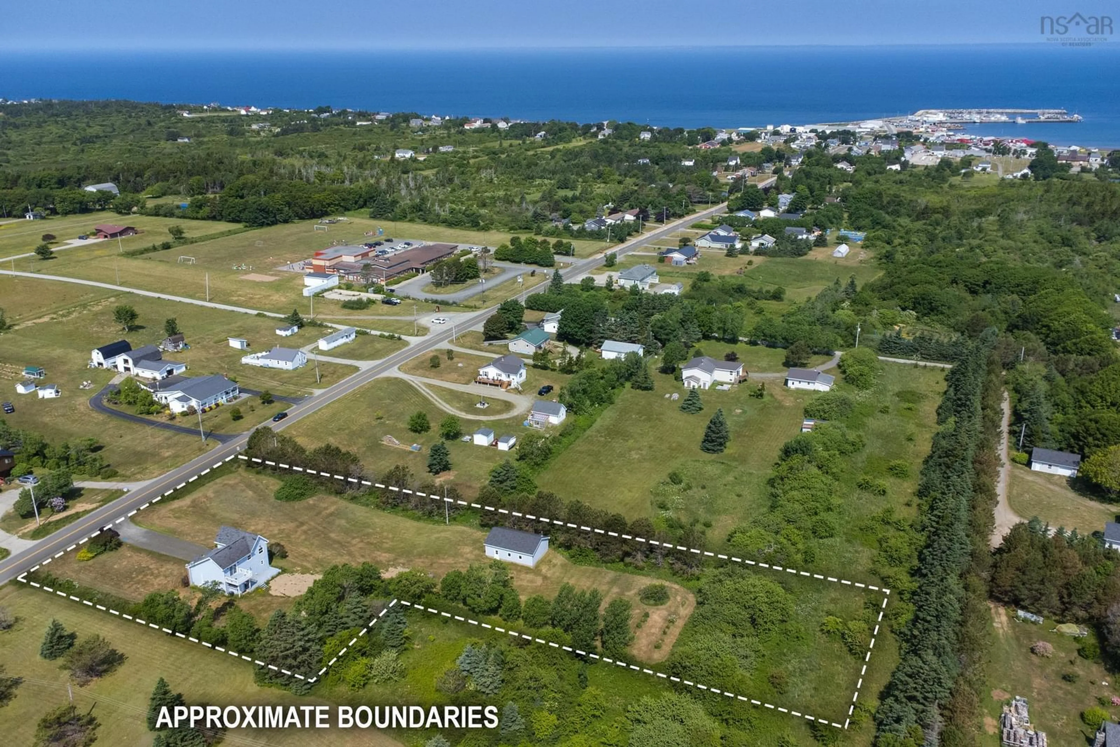 A pic from outside/outdoor area/front of a property/back of a property/a pic from drone, street for 343 Peter Dugas Rd, Meteghan Nova Scotia B0W 2J0