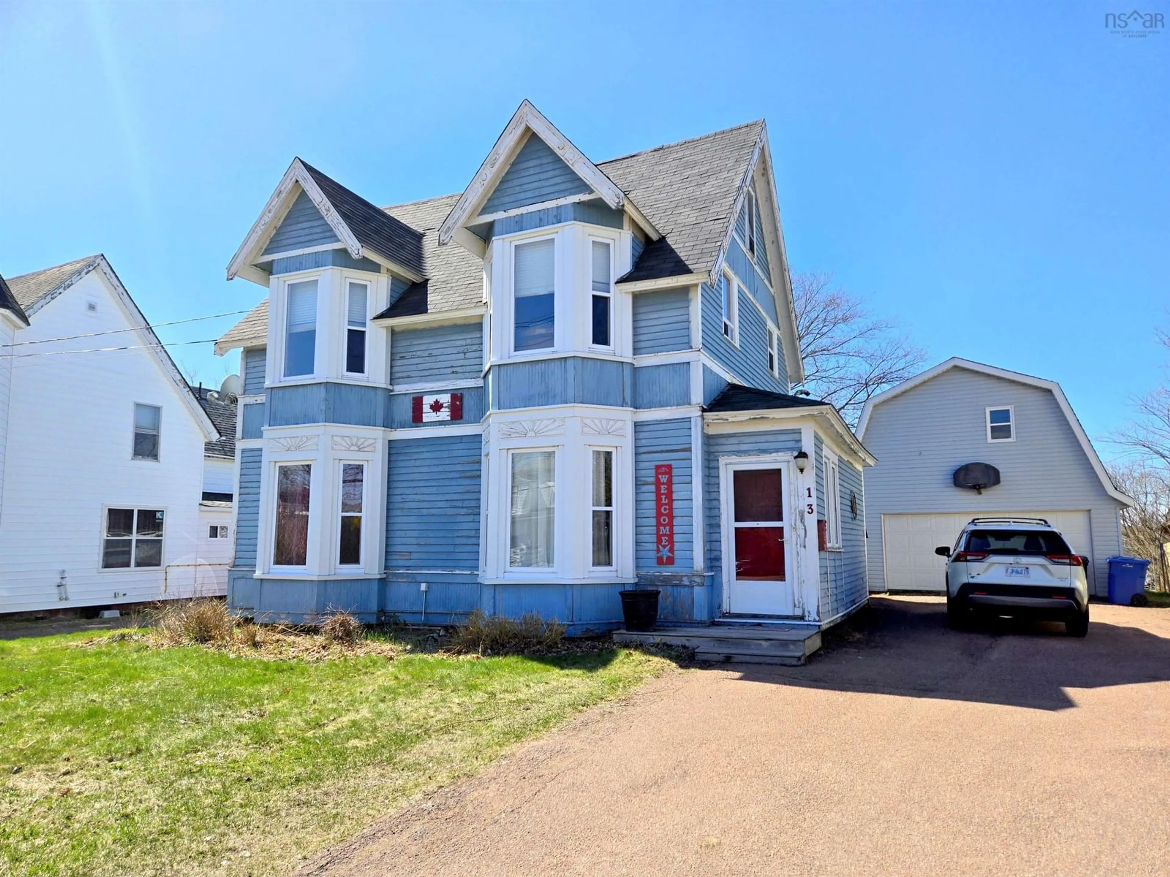Home with vinyl exterior material, street for 13 West Victoria St, Amherst Nova Scotia B4H 1B7