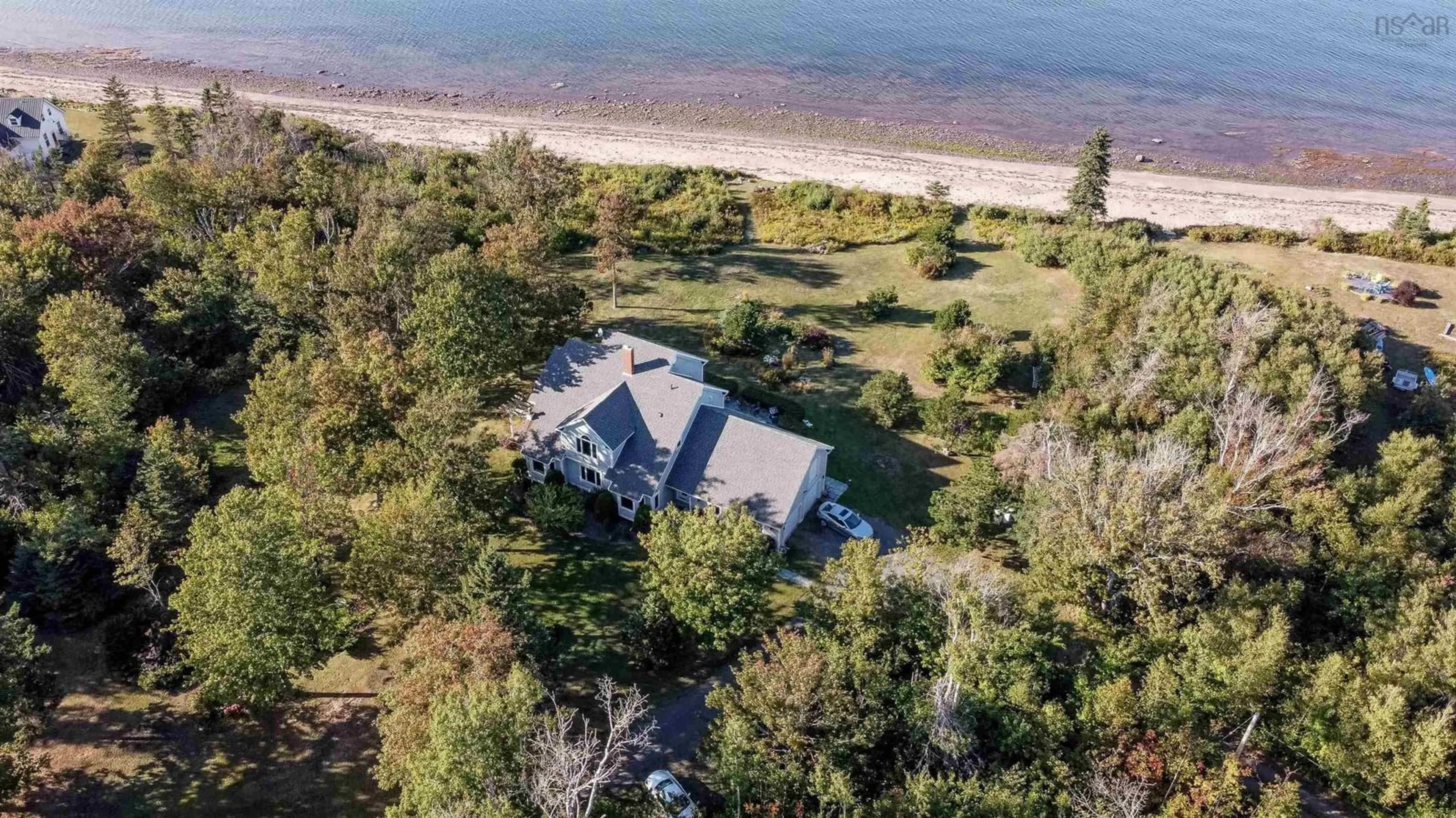 A pic from outside/outdoor area/front of a property/back of a property/a pic from drone, water/lake/river/ocean view for 284 James Way, Caribou River Nova Scotia B0K 1H0