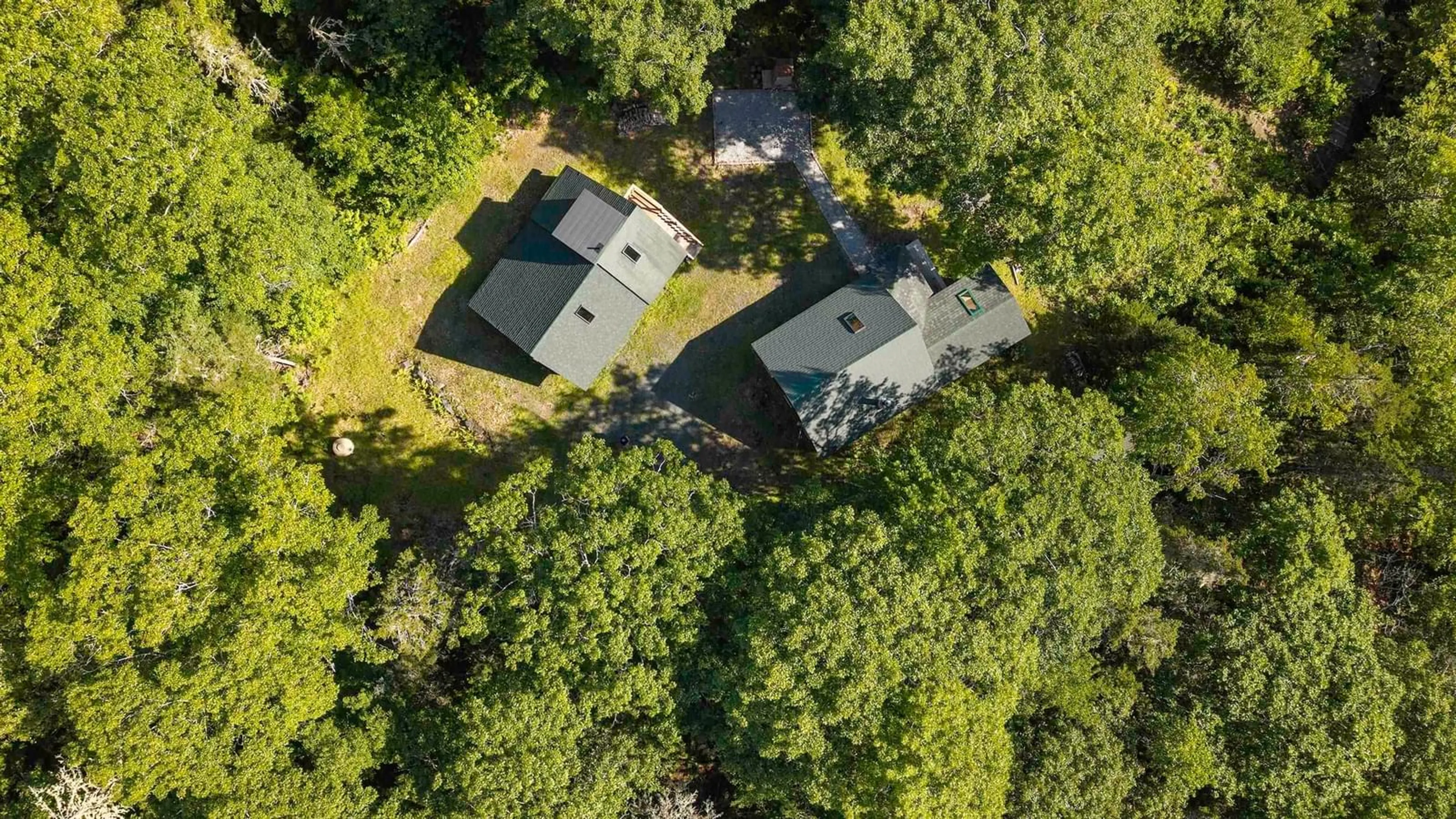 A pic from outside/outdoor area/front of a property/back of a property/a pic from drone, forest/trees view for 616 Lac A Pic Rd, Quinan Nova Scotia B0W 3M0