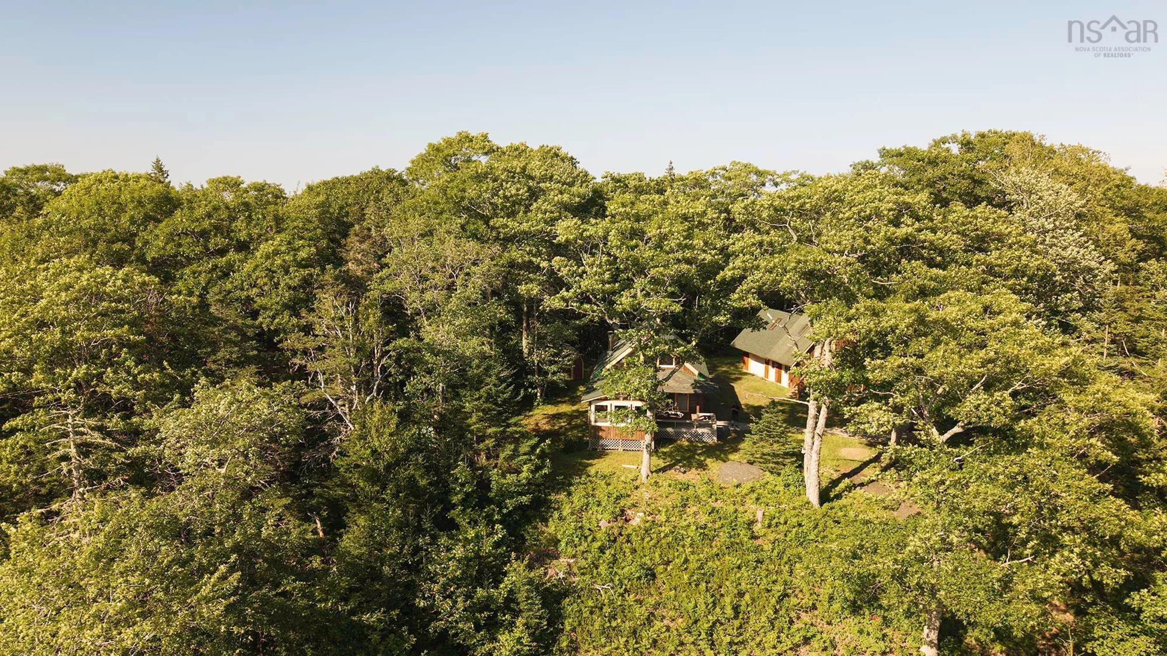 A pic from outside/outdoor area/front of a property/back of a property/a pic from drone, forest/trees view for 616 Lac A Pic Rd, Quinan Nova Scotia B0W 3M0