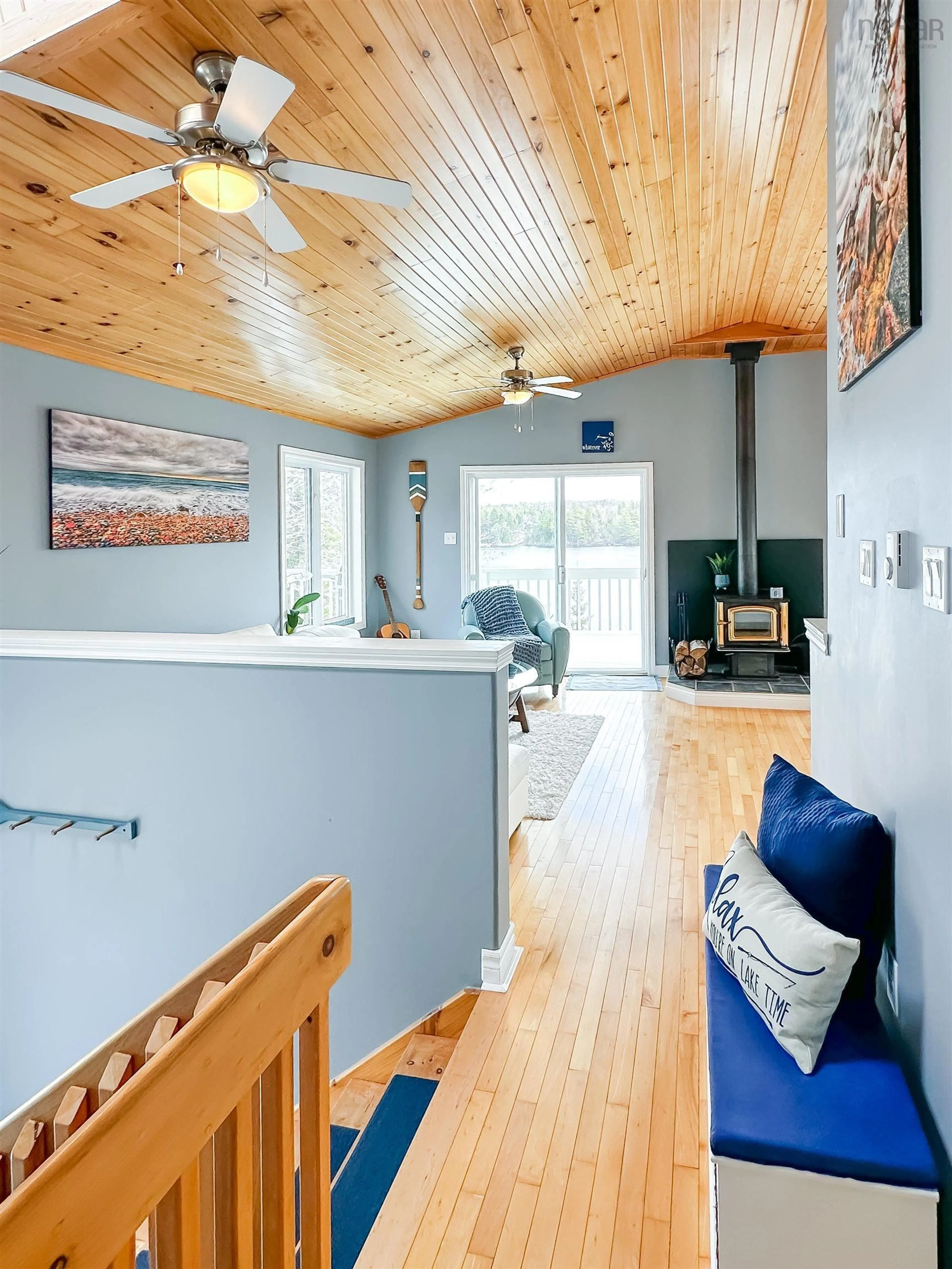 Living room with furniture, wood/laminate floor for 158 Spruce Dr, Aylesford Lake Nova Scotia B0P 1C0