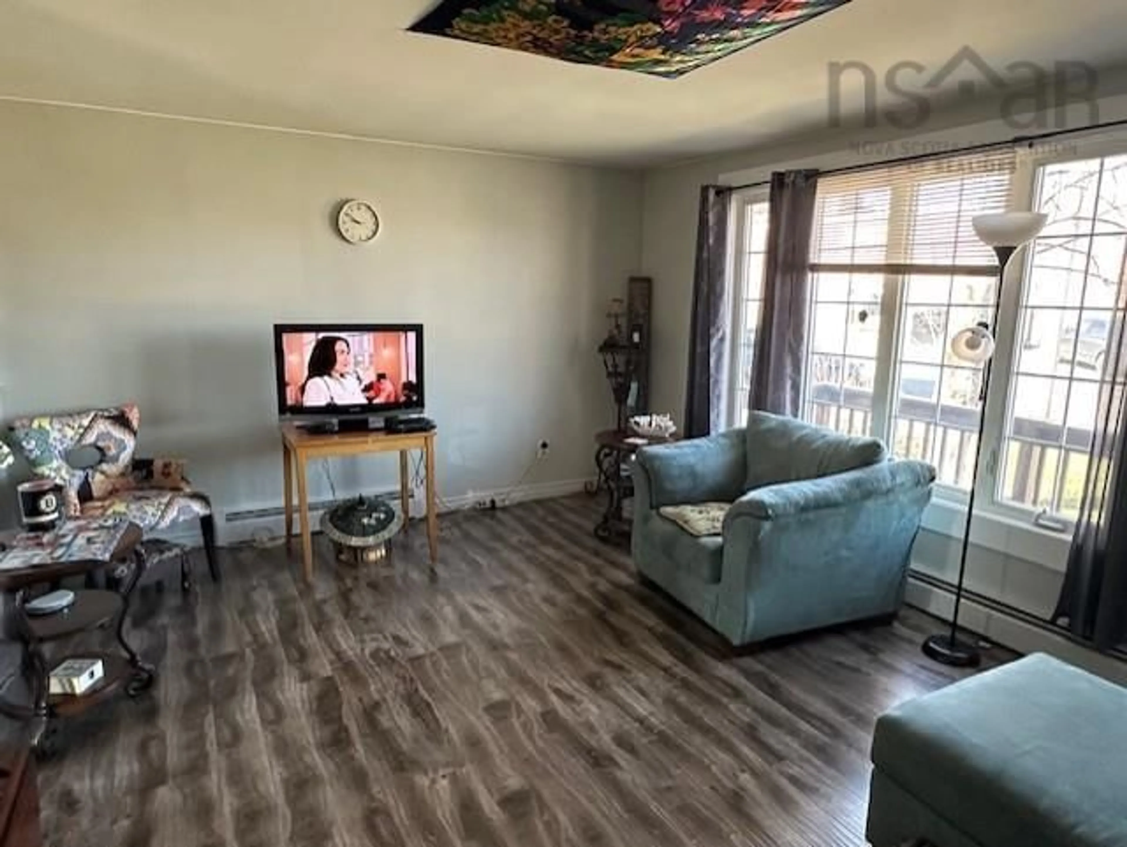 Living room with furniture, wood/laminate floor for 750 Summer St, New Glasgow Nova Scotia B2H 3Y8