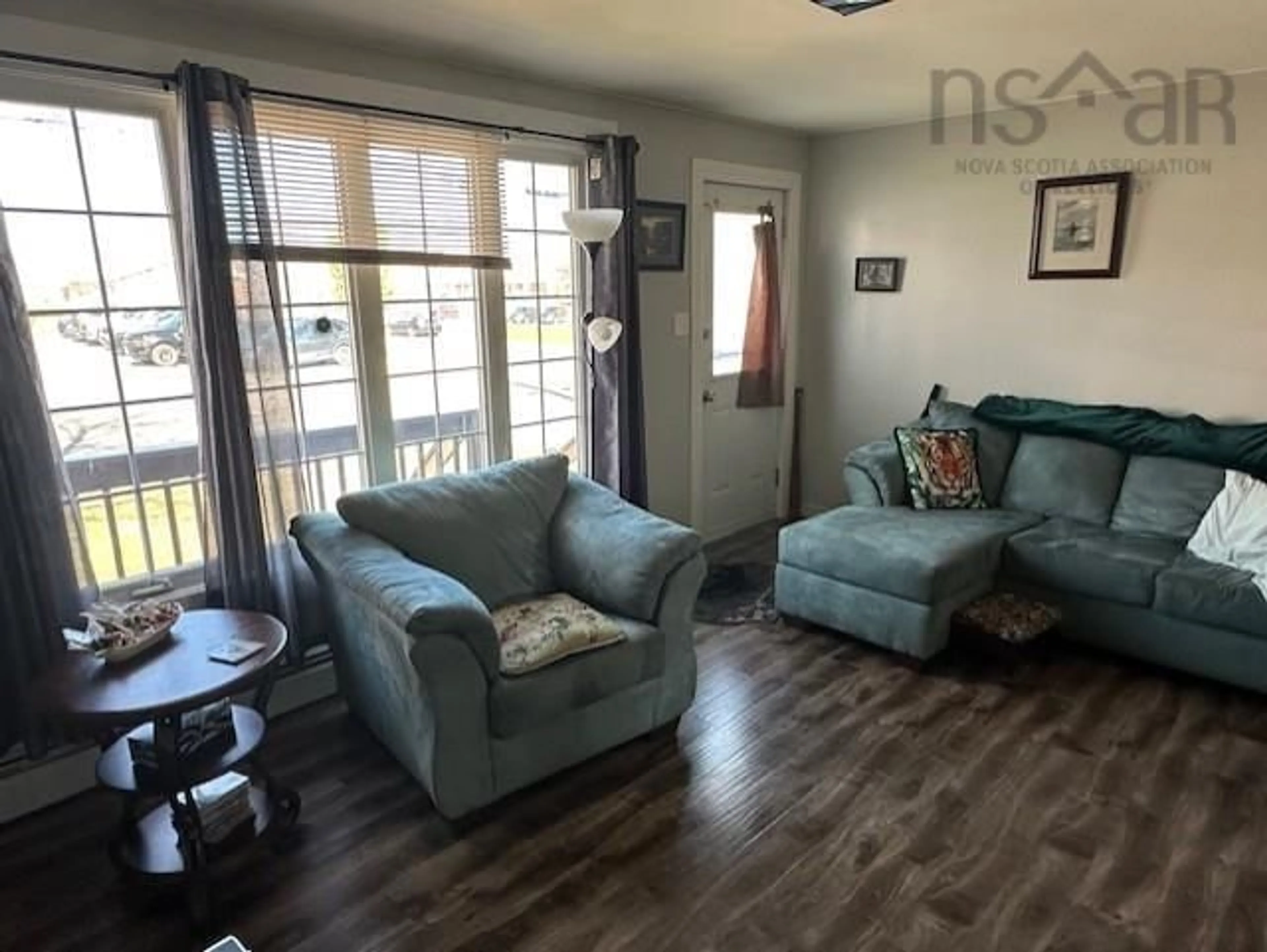 Living room with furniture, wood/laminate floor for 750 Summer St, New Glasgow Nova Scotia B2H 3Y8