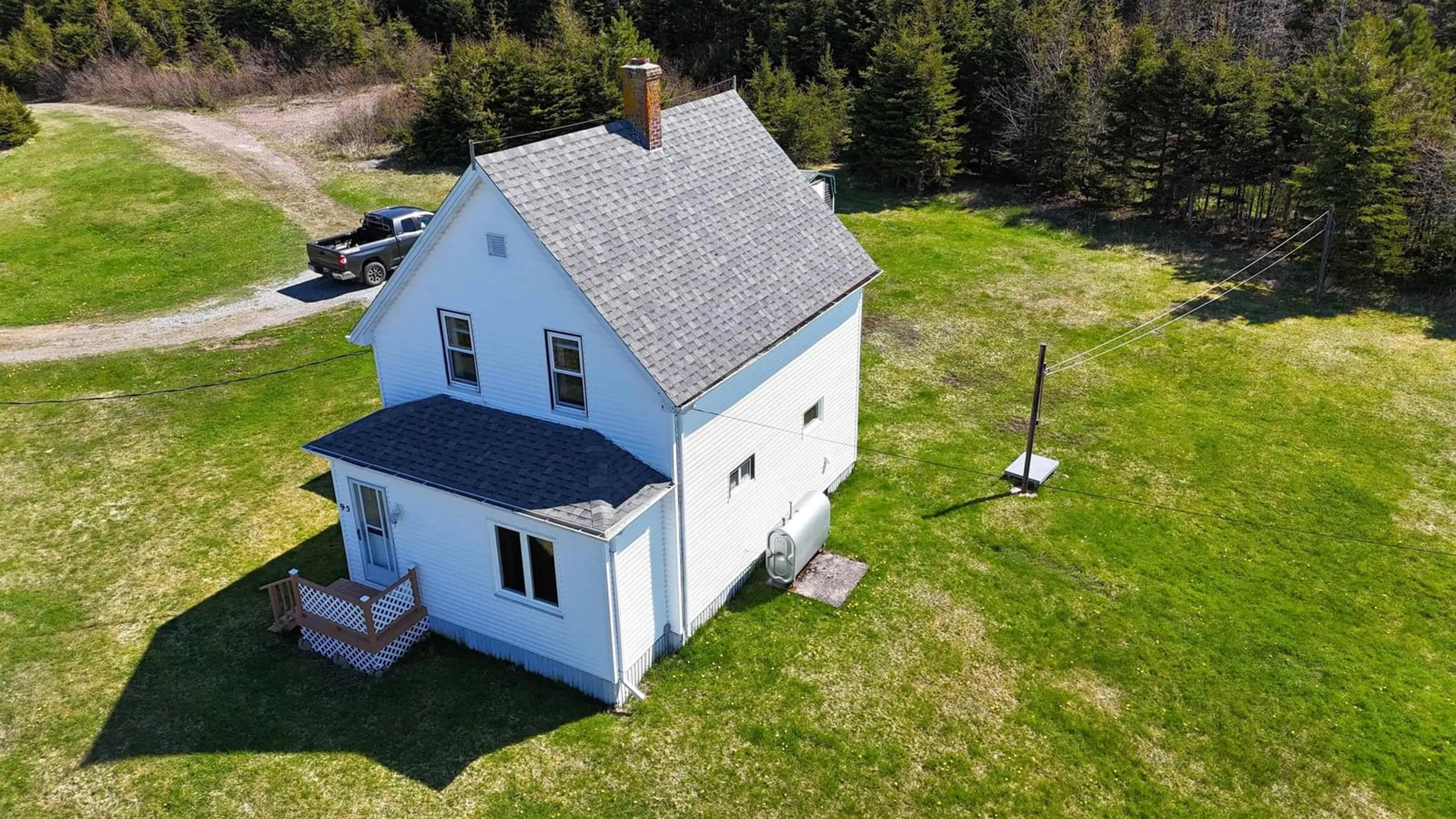 A pic from outside/outdoor area/front of a property/back of a property/a pic from drone, building for 95 Church Point Rd, River Bourgeois Nova Scotia B0E 2X0