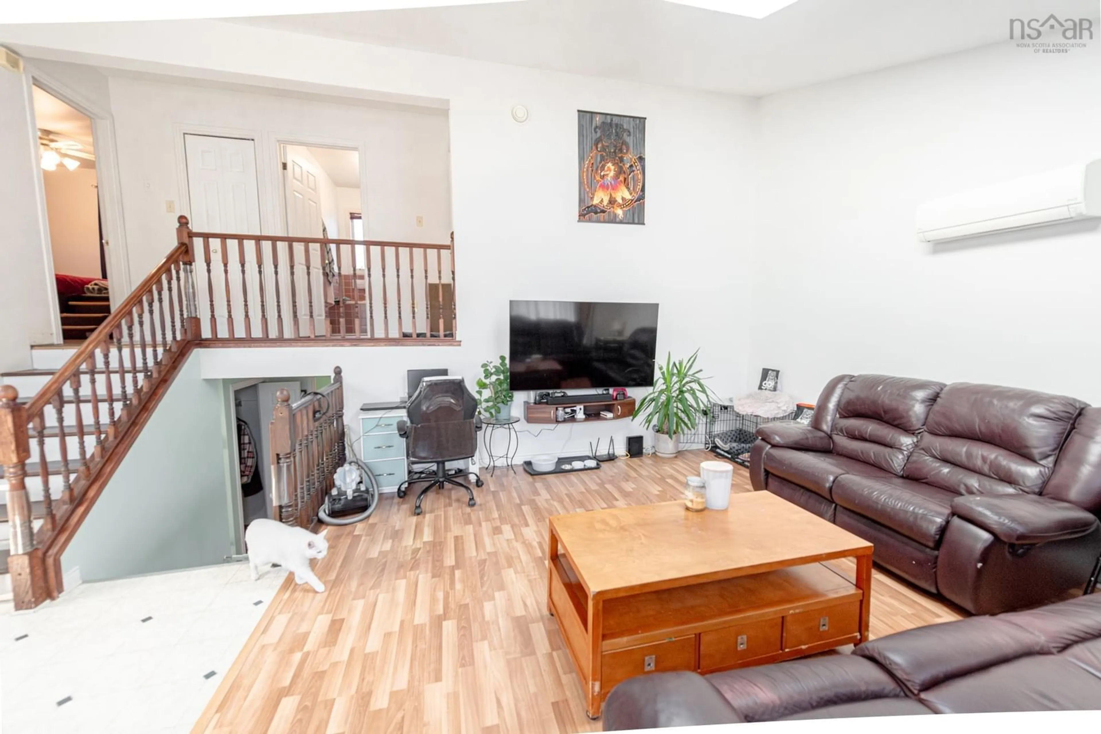 Living room with furniture, wood/laminate floor for 494 Lorne St, New Glasgow Nova Scotia B2H 4L3