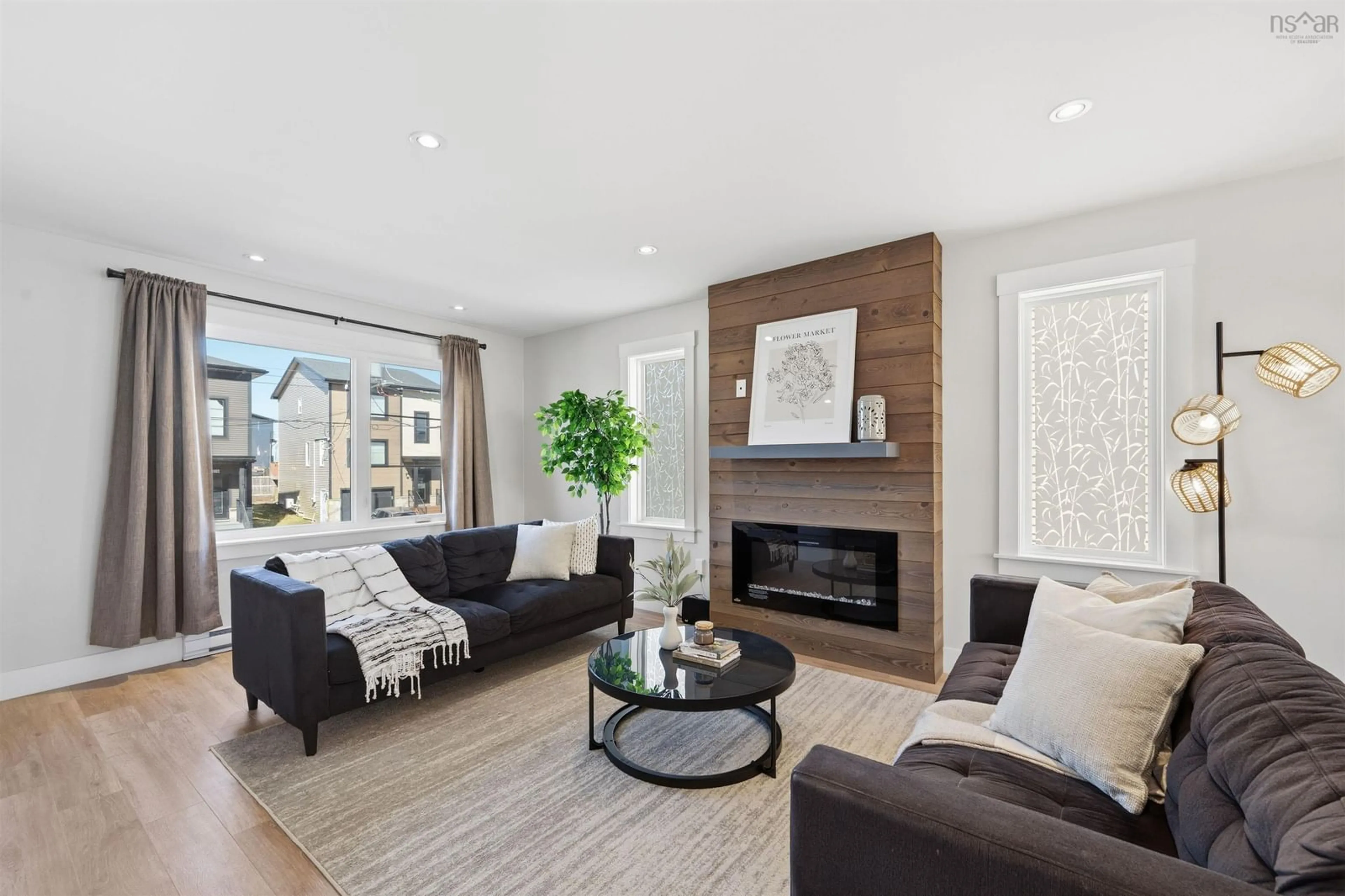 Living room with furniture, wood/laminate floor for 105 Titanium Cres, Halifax Nova Scotia B3P 0J3