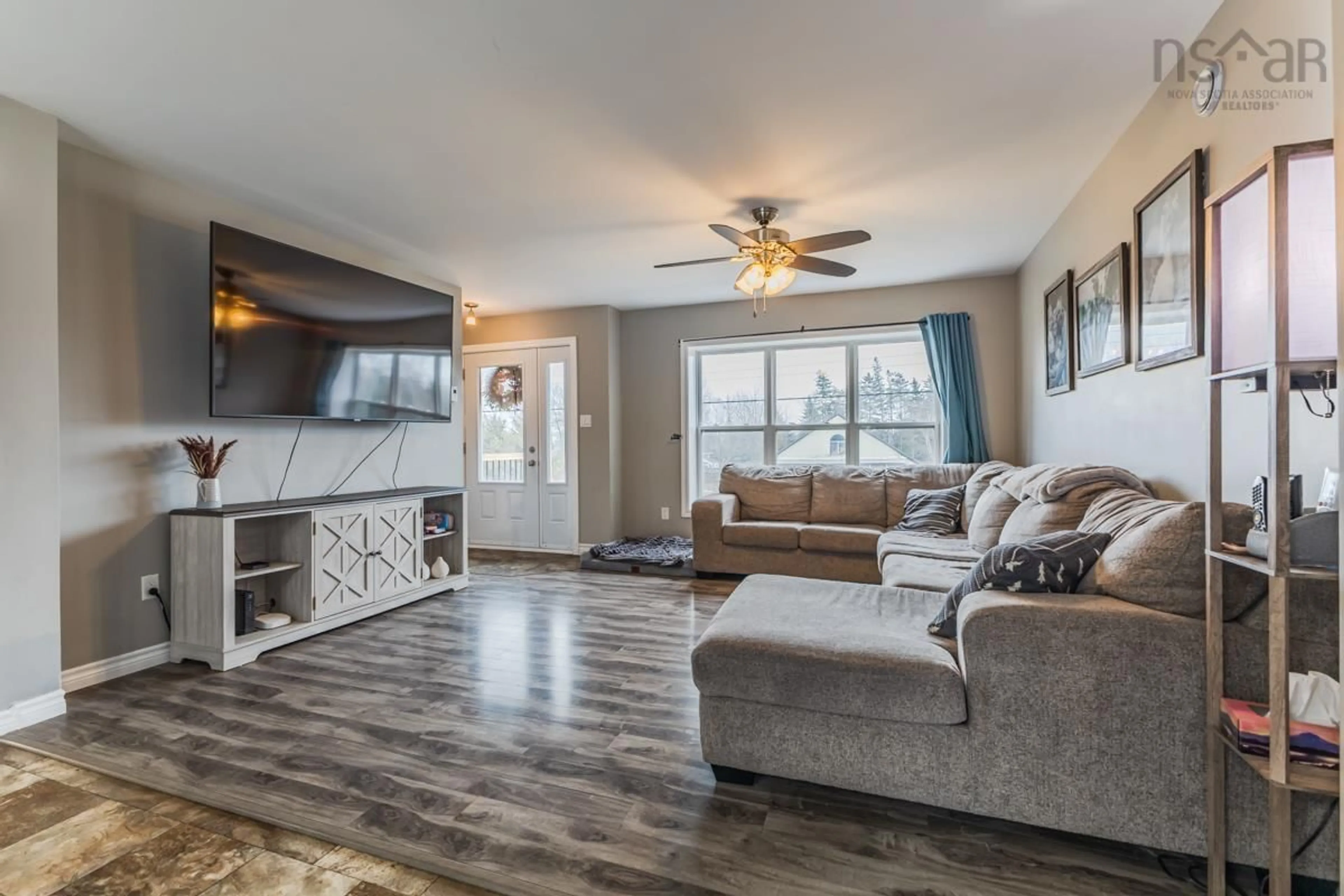 Living room with furniture, wood/laminate floor for 196 Rocky Ridge Rd, Truro Heights Nova Scotia B6L 1S5