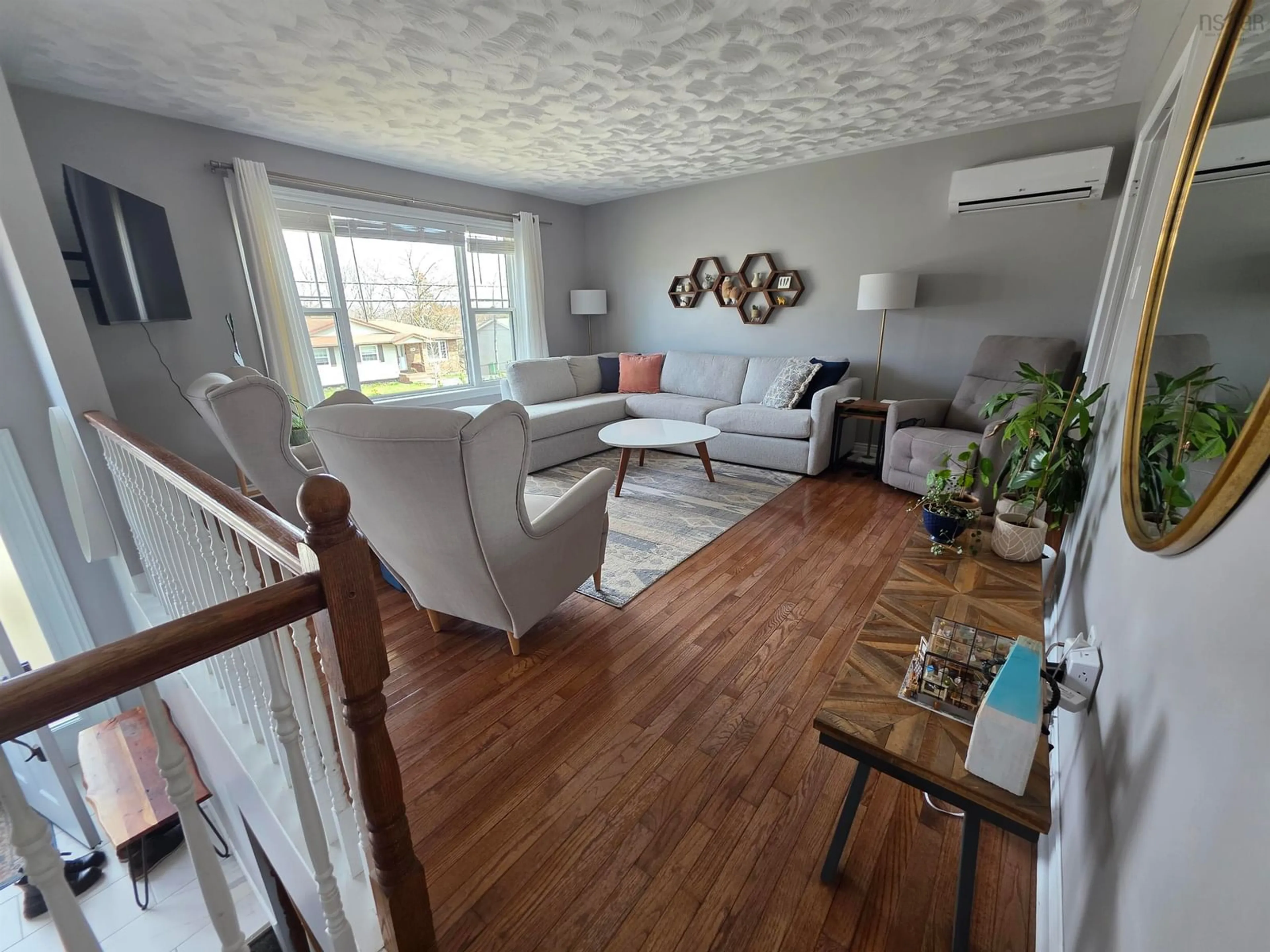 Living room with furniture, wood/laminate floor for 249 Auburn Dr, Cole Harbour Nova Scotia B2W 6E9