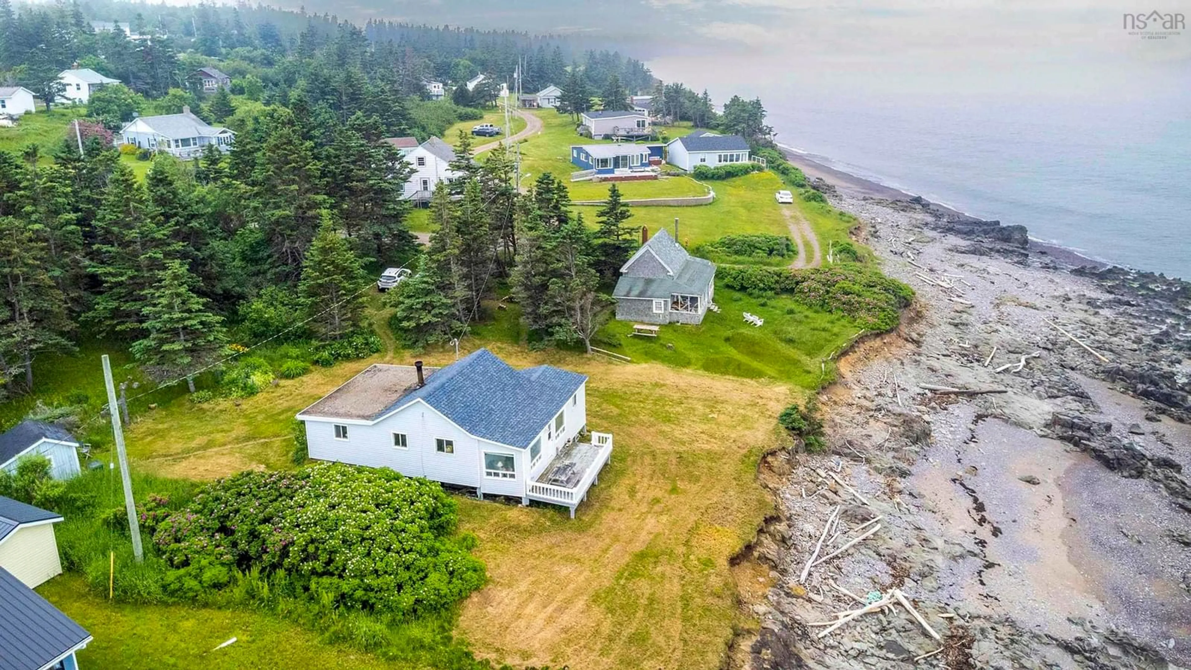 A pic from outside/outdoor area/front of a property/back of a property/a pic from drone, water/lake/river/ocean view for 9 Gordon Road, Margaretsville Nova Scotia B0S 1N0
