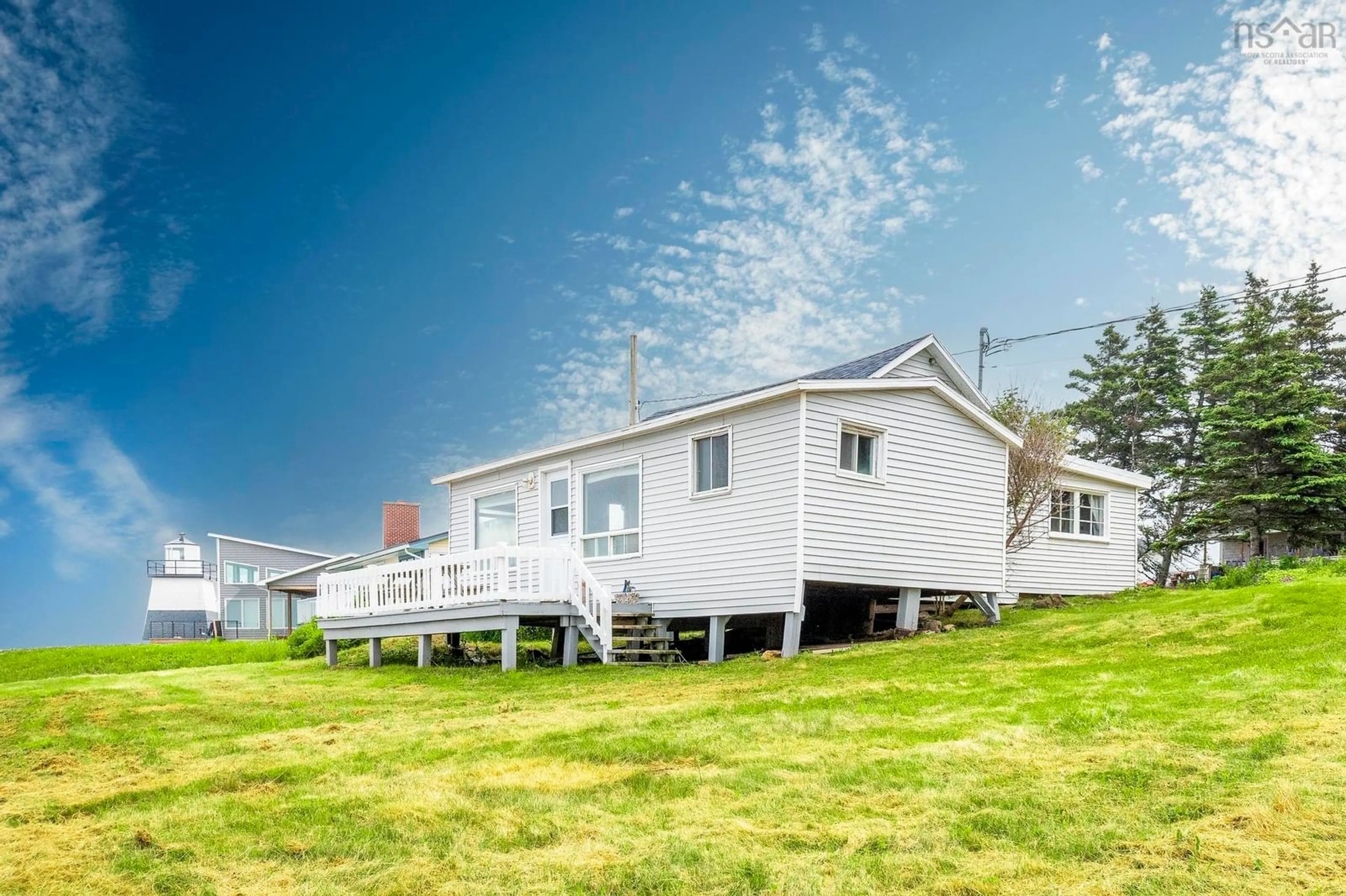 A pic from outside/outdoor area/front of a property/back of a property/a pic from drone, unknown for 9 Gordon Road, Margaretsville Nova Scotia B0S 1N0