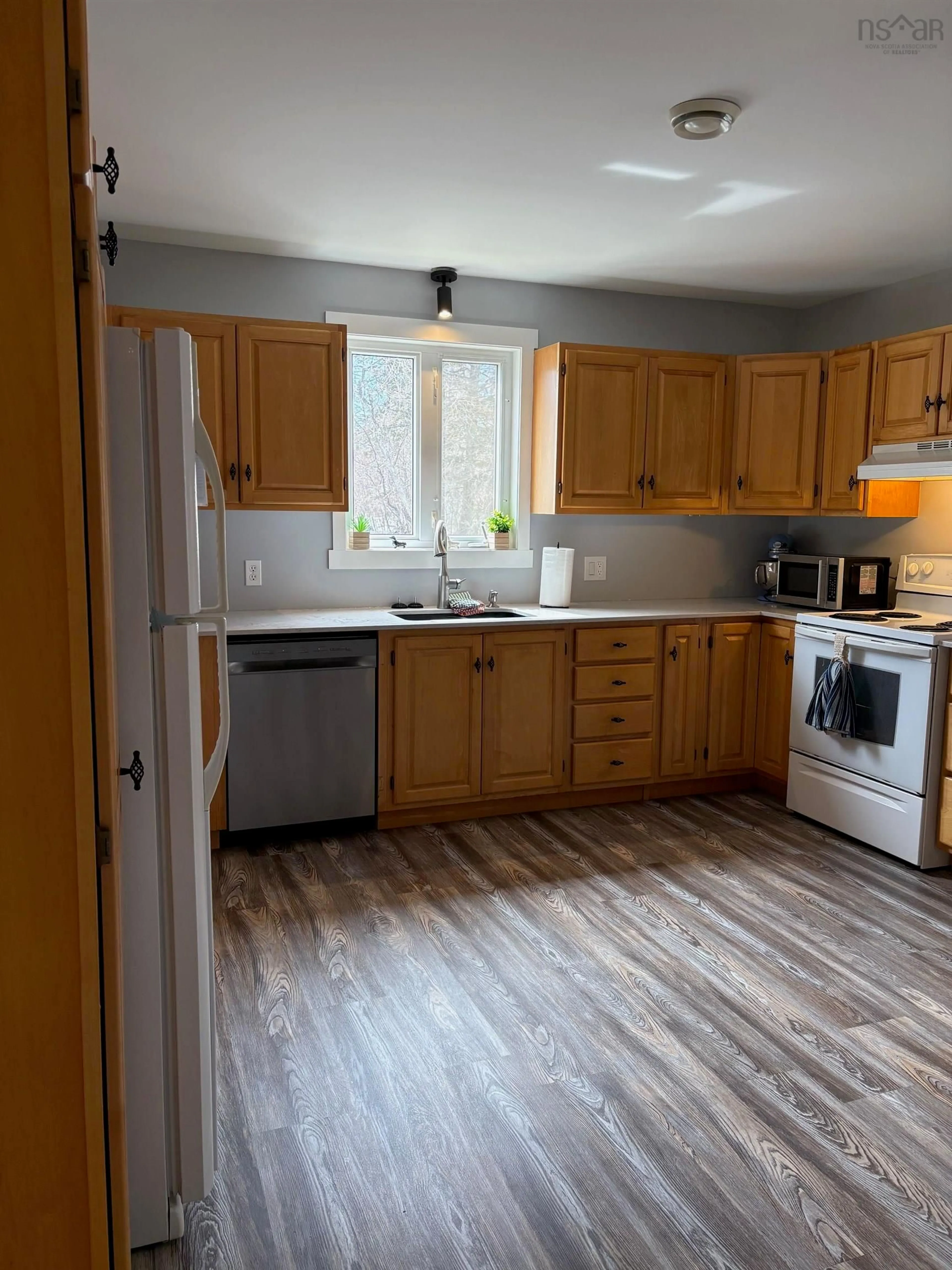 Standard kitchen, wood/laminate floor for 2865 West Big Intervale Rd, Margaree Centre Nova Scotia B0E 2C0