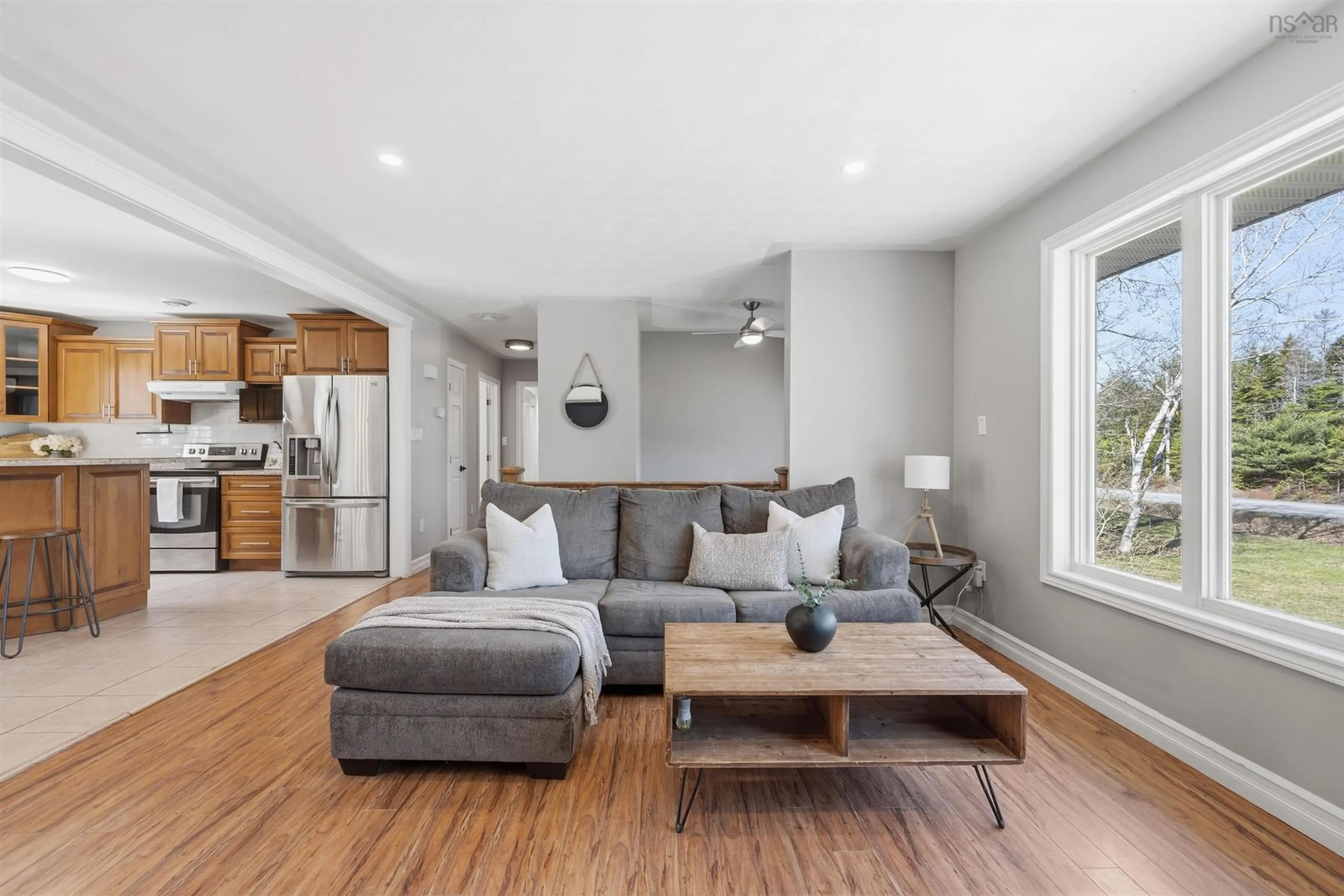 Living room with furniture, wood/laminate floor for 1410 Lucasville Rd, Hammonds Plains Nova Scotia B4B 1P7