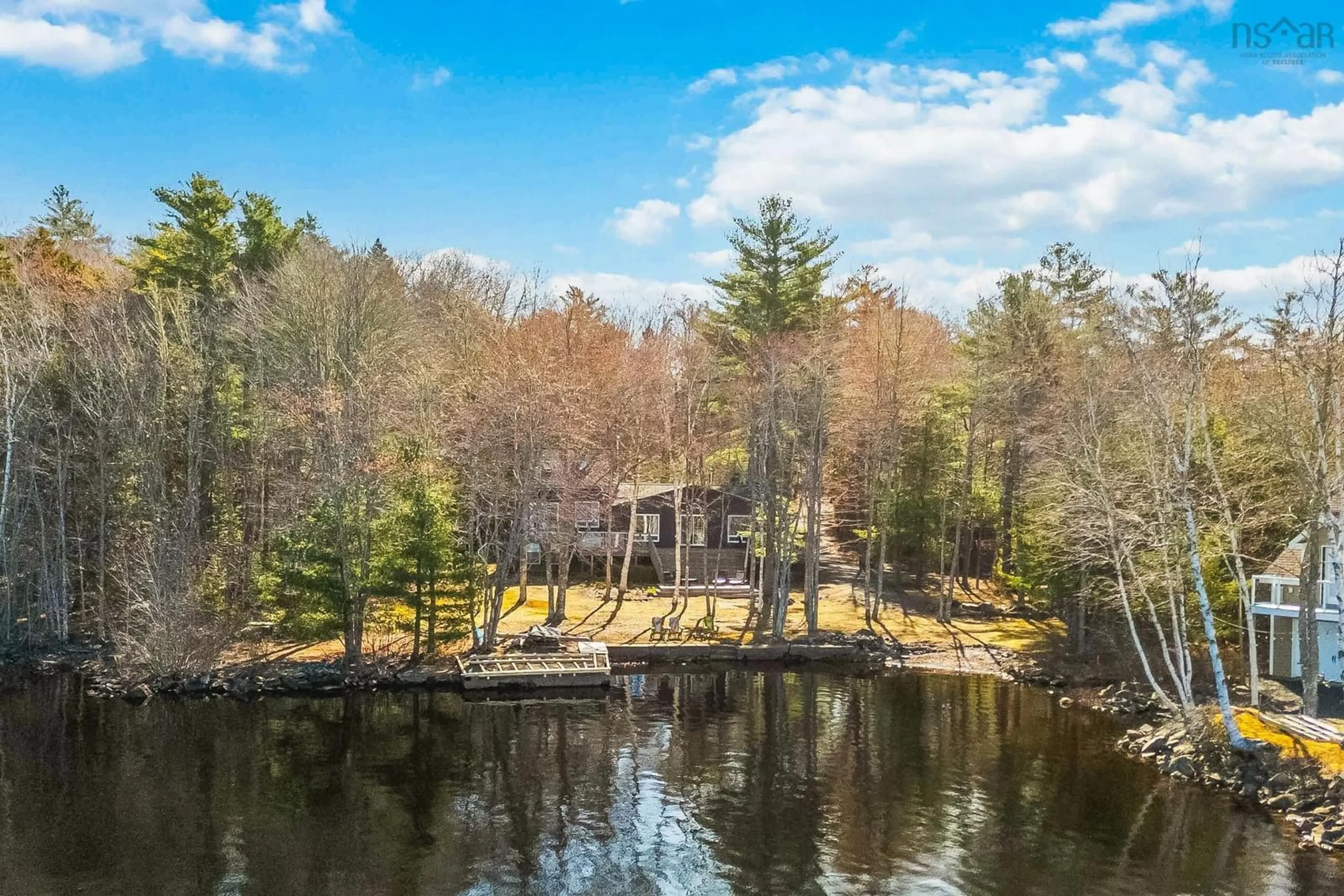 A pic from outside/outdoor area/front of a property/back of a property/a pic from drone, water/lake/river/ocean view for 672 Molega Lake Rd, Molega Lake Nova Scotia B4V 8T9