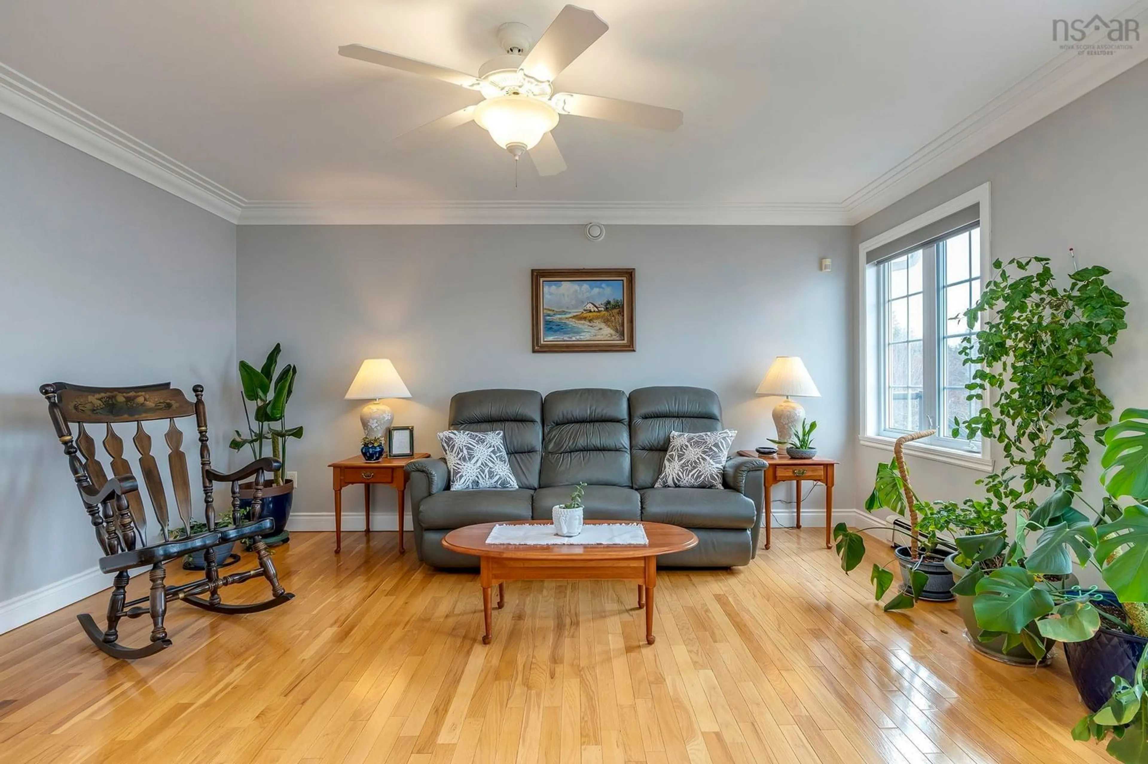 Living room with furniture, wood/laminate floor for 228 Ostrea Lake Rd, Ostrea Lake Nova Scotia B0J 2L0