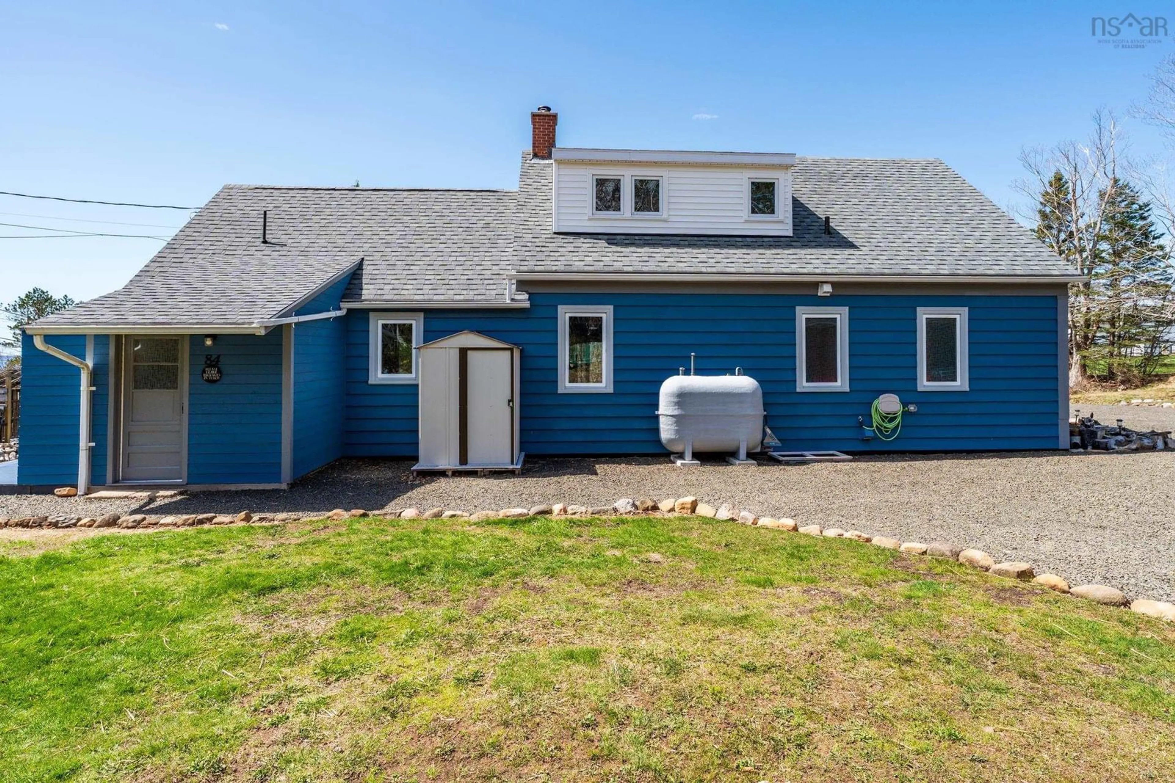 Home with vinyl exterior material, street for 84 Old Post Rd, Clementsport Nova Scotia B0S 1E0