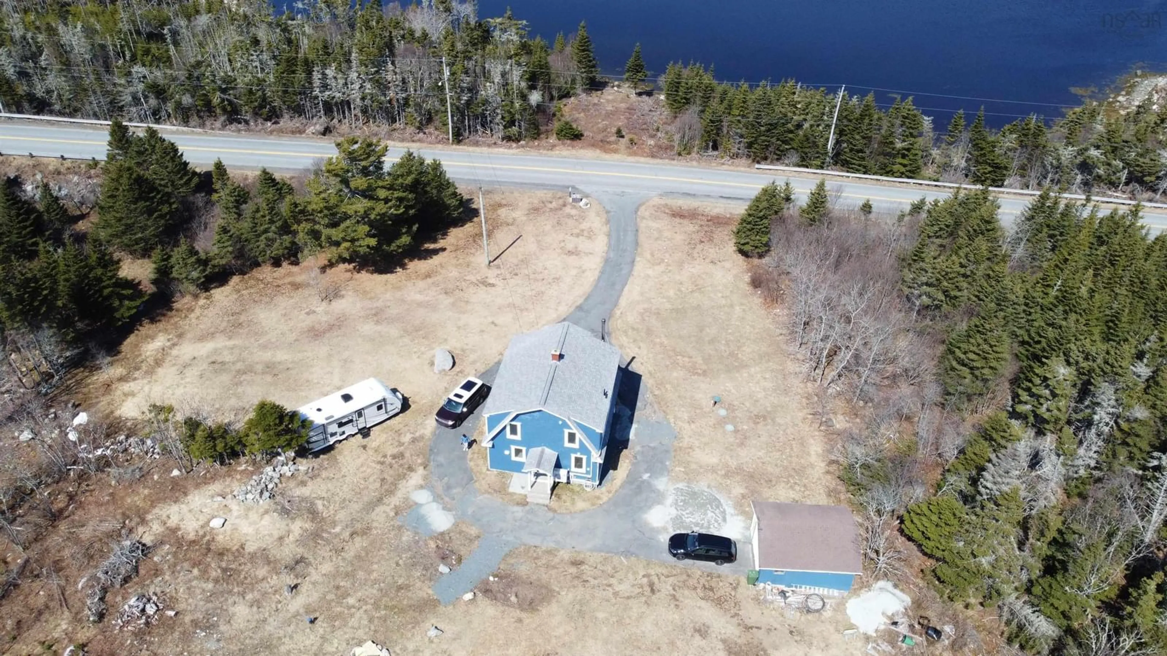 A pic from outside/outdoor area/front of a property/back of a property/a pic from drone, water/lake/river/ocean view for 2351 Ostrea Lake Road  Pleasant Point Rd, Ostrea Lake Nova Scotia B0J 2L0