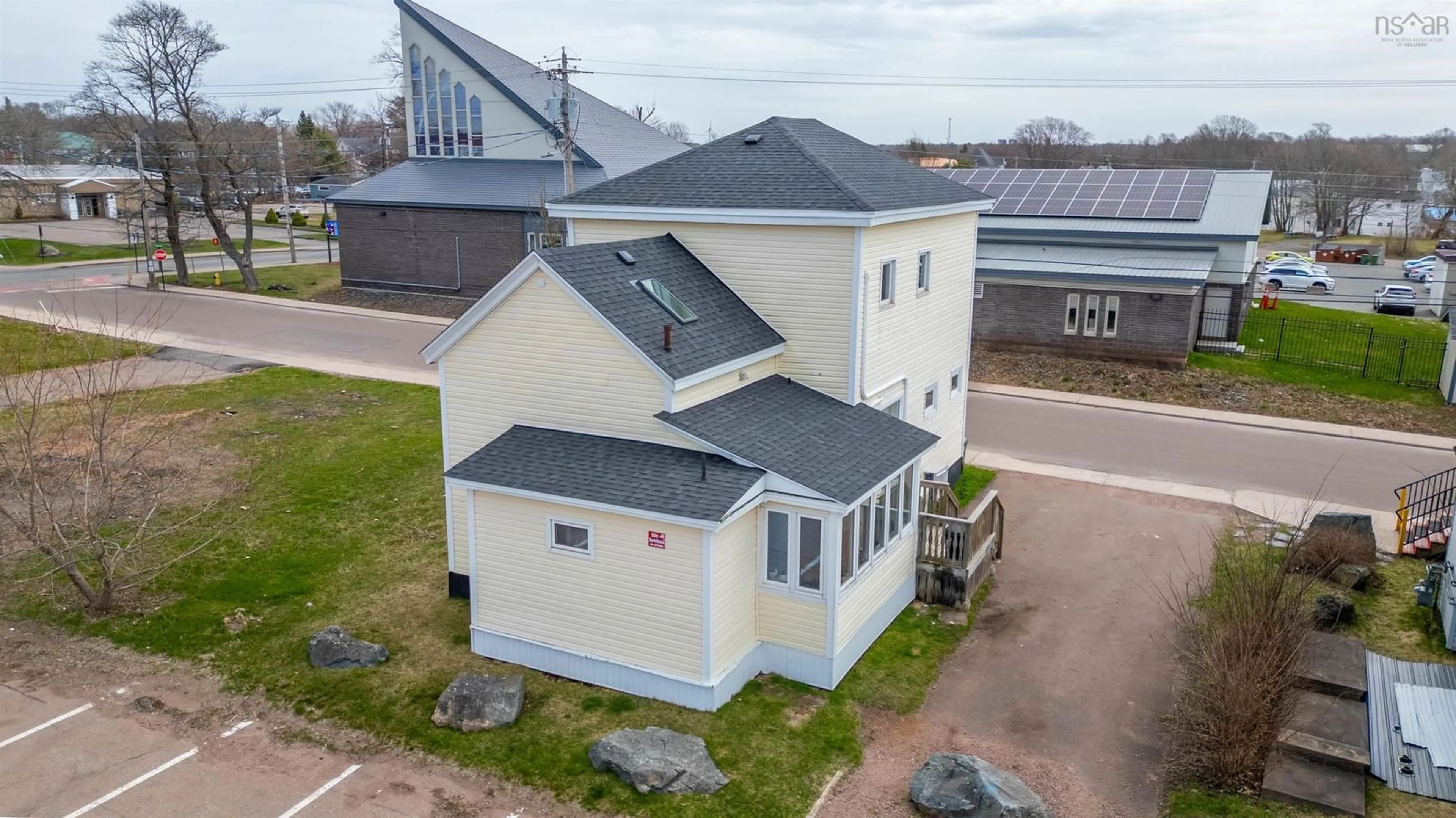 A pic from outside/outdoor area/front of a property/back of a property/a pic from drone, building for 14 Prince Arthur St, Amherst Nova Scotia B4H 1V4