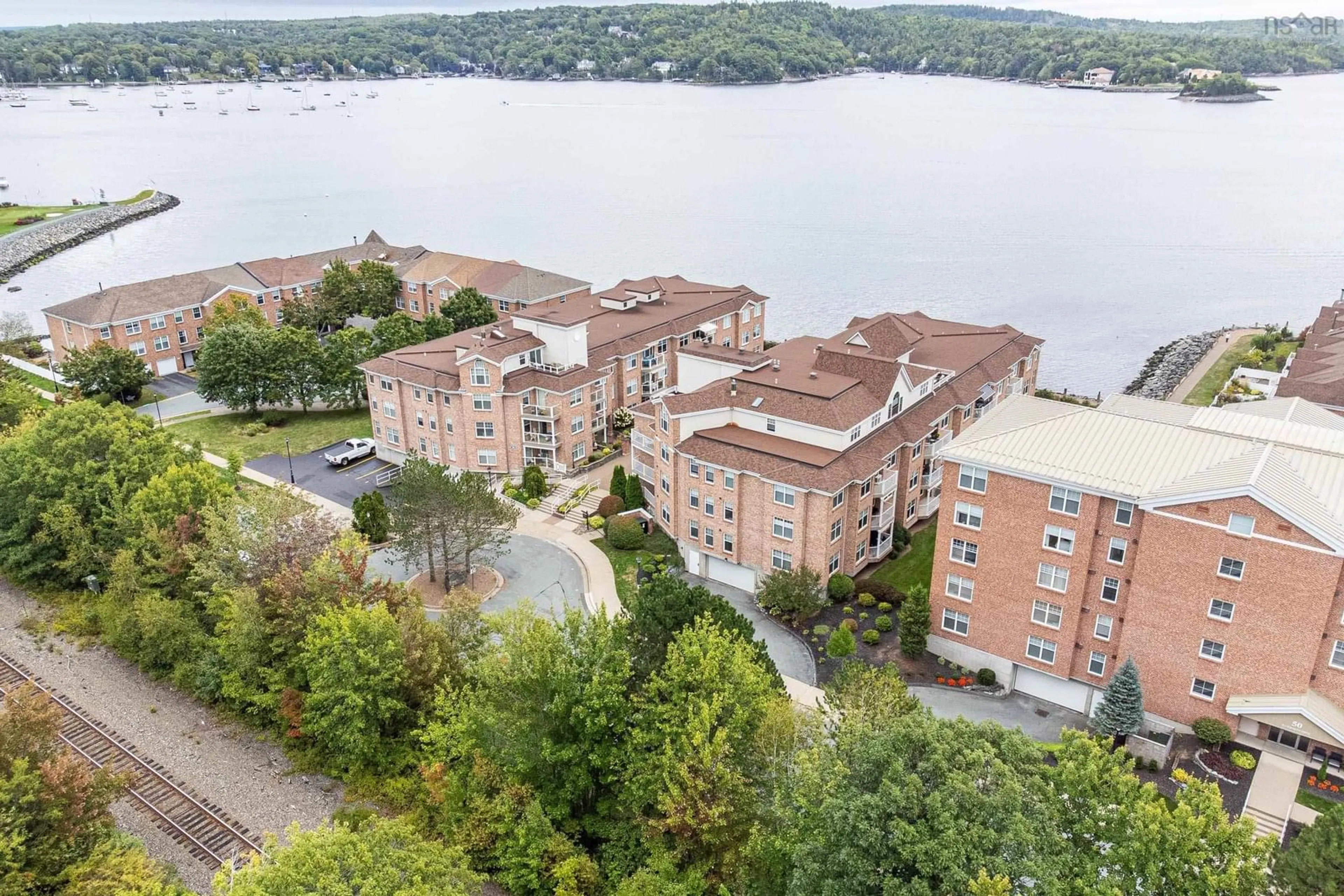 A pic from outside/outdoor area/front of a property/back of a property/a pic from drone, water/lake/river/ocean view for 40 Waterfront Dr #304, Bedford Nova Scotia B4A 4J1