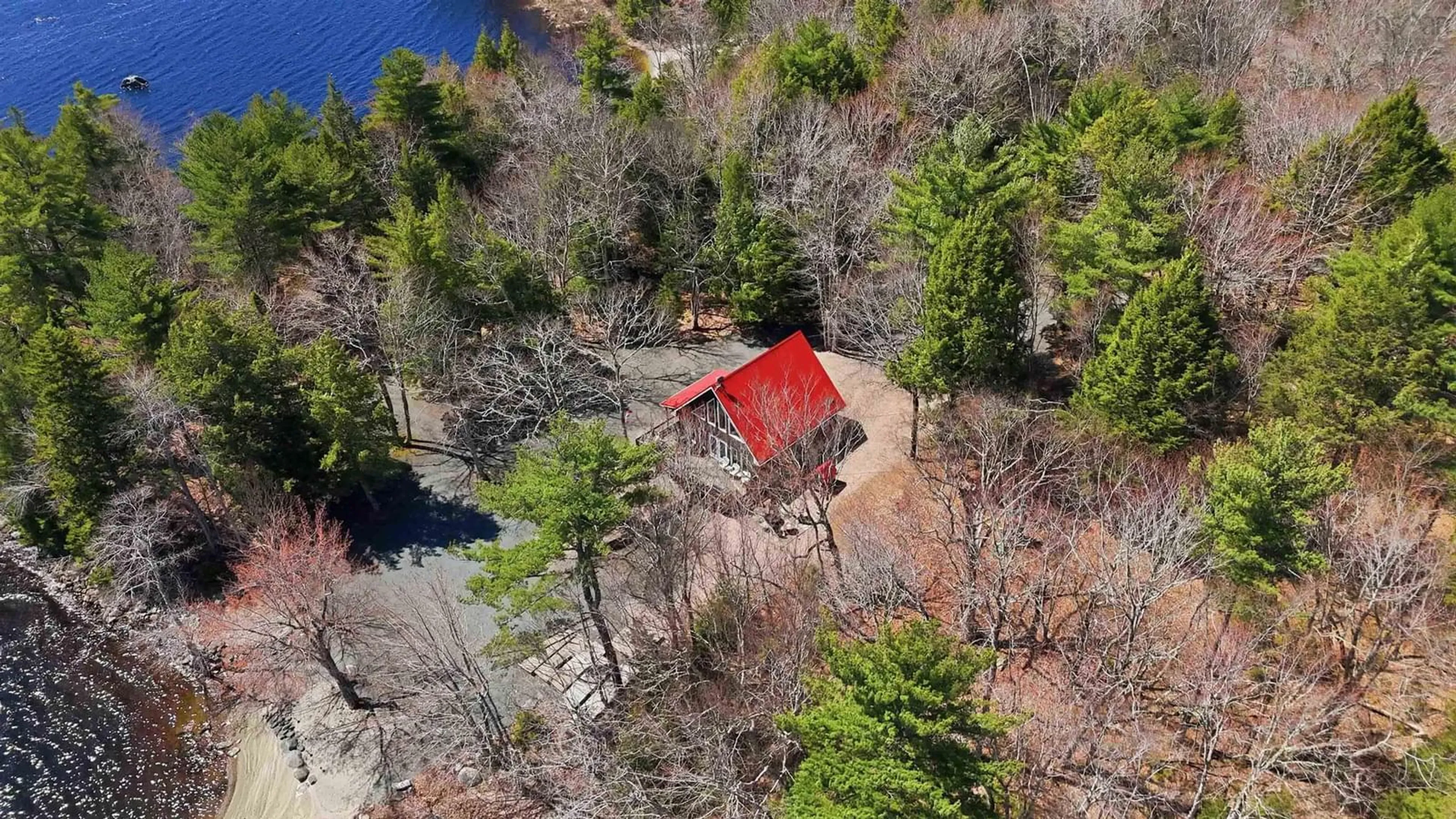 A pic from outside/outdoor area/front of a property/back of a property/a pic from drone, forest/trees view for 58 Naugler Rd, Labelle Nova Scotia B0T 1E0