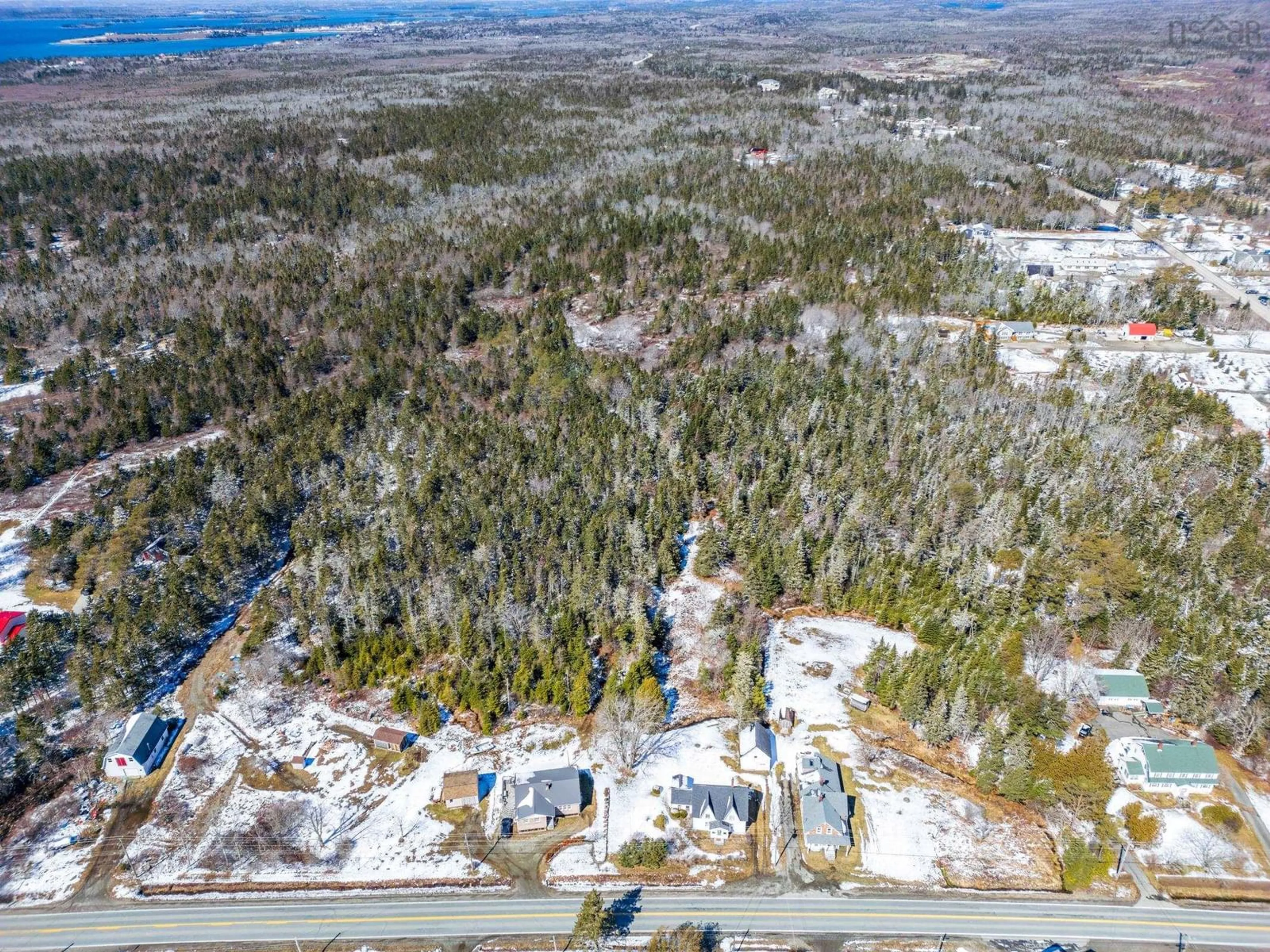 A pic from outside/outdoor area/front of a property/back of a property/a pic from drone, unknown for 46 Highway 335, Pubnico Nova Scotia B0W 3S0