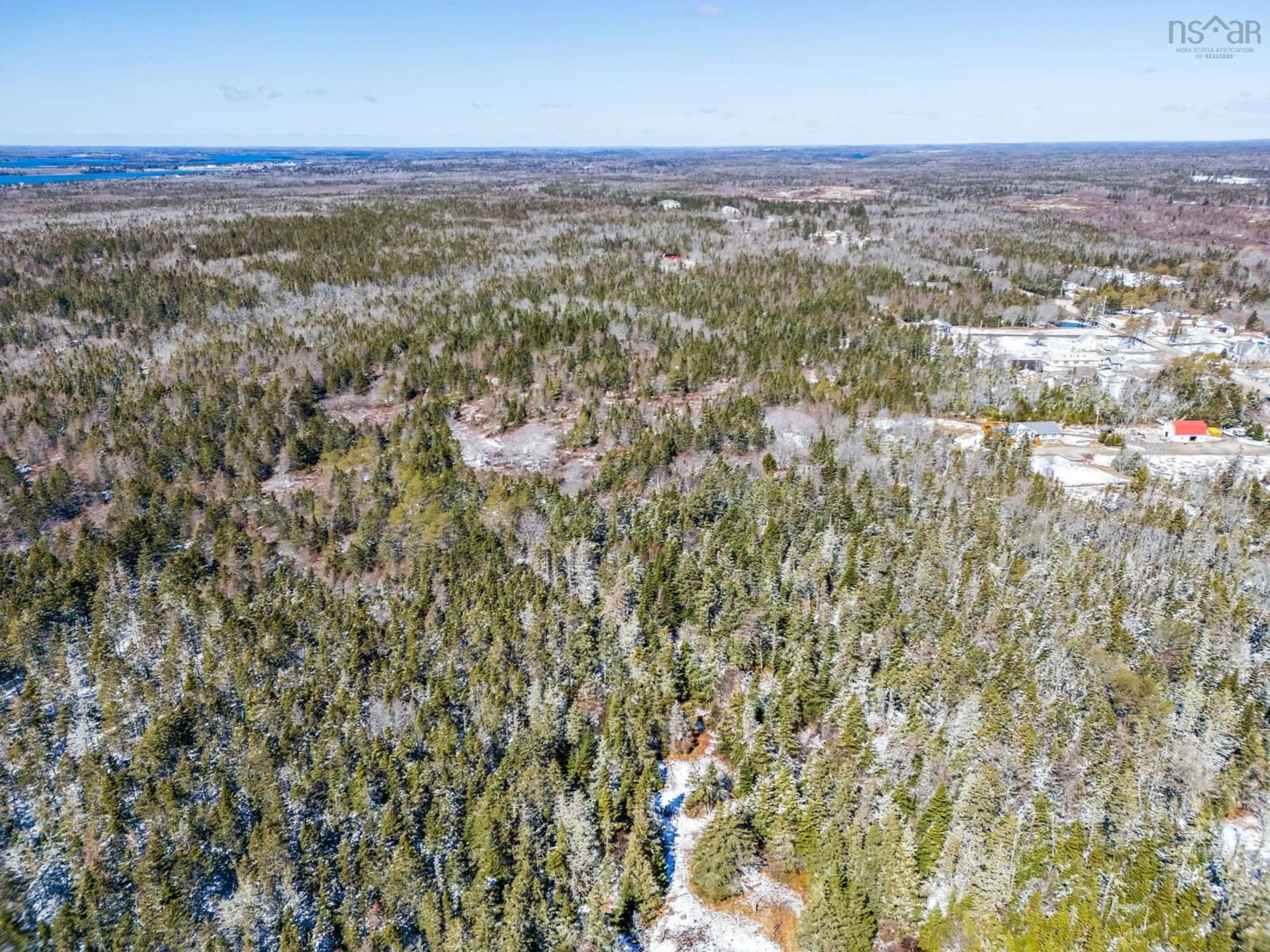 A pic from outside/outdoor area/front of a property/back of a property/a pic from drone, forest/trees view for 46 Highway 335, Pubnico Nova Scotia B0W 3S0