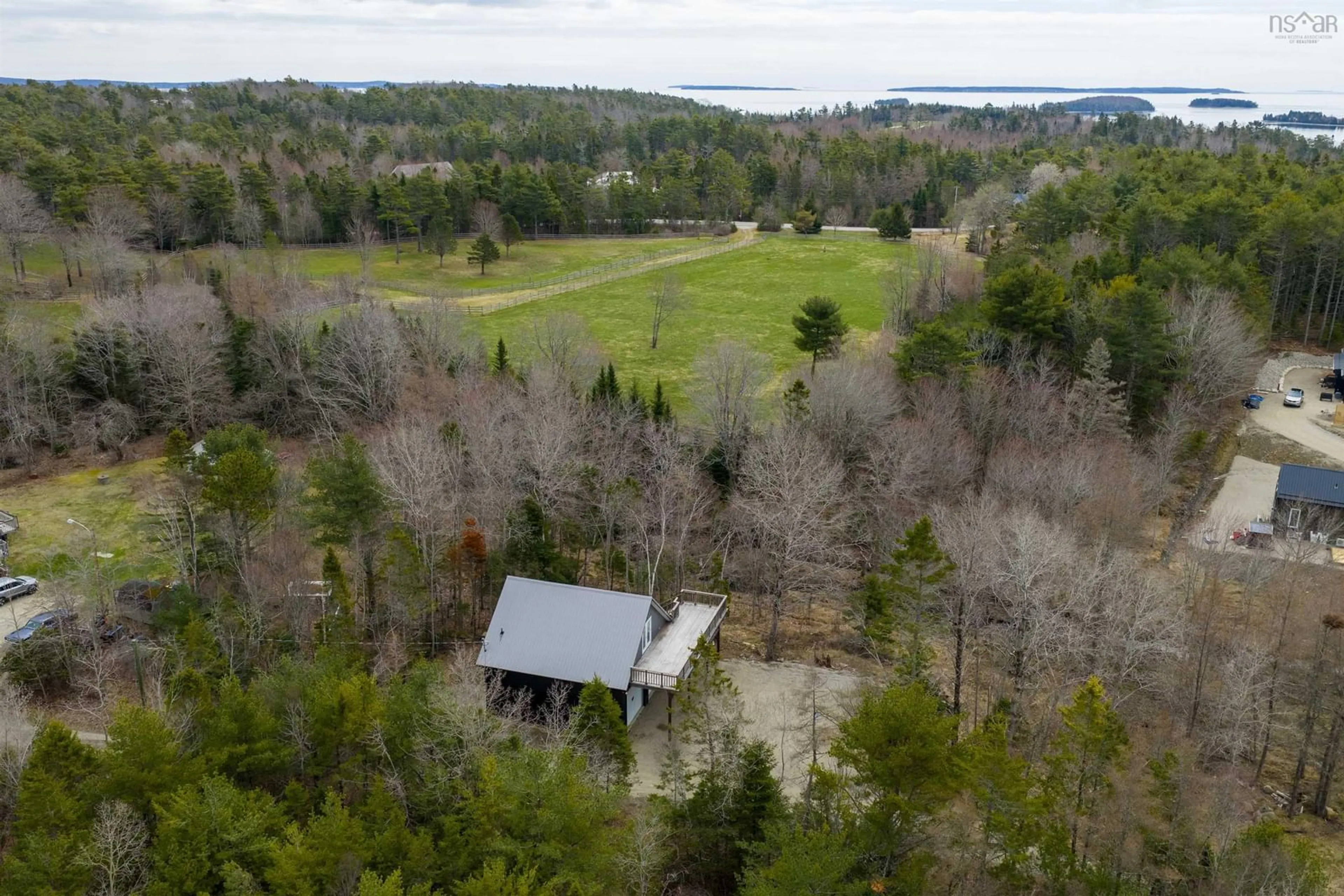 A pic from outside/outdoor area/front of a property/back of a property/a pic from drone, water/lake/river/ocean view for 27 Pig Loop Rd, Chester Nova Scotia B0J 1J0