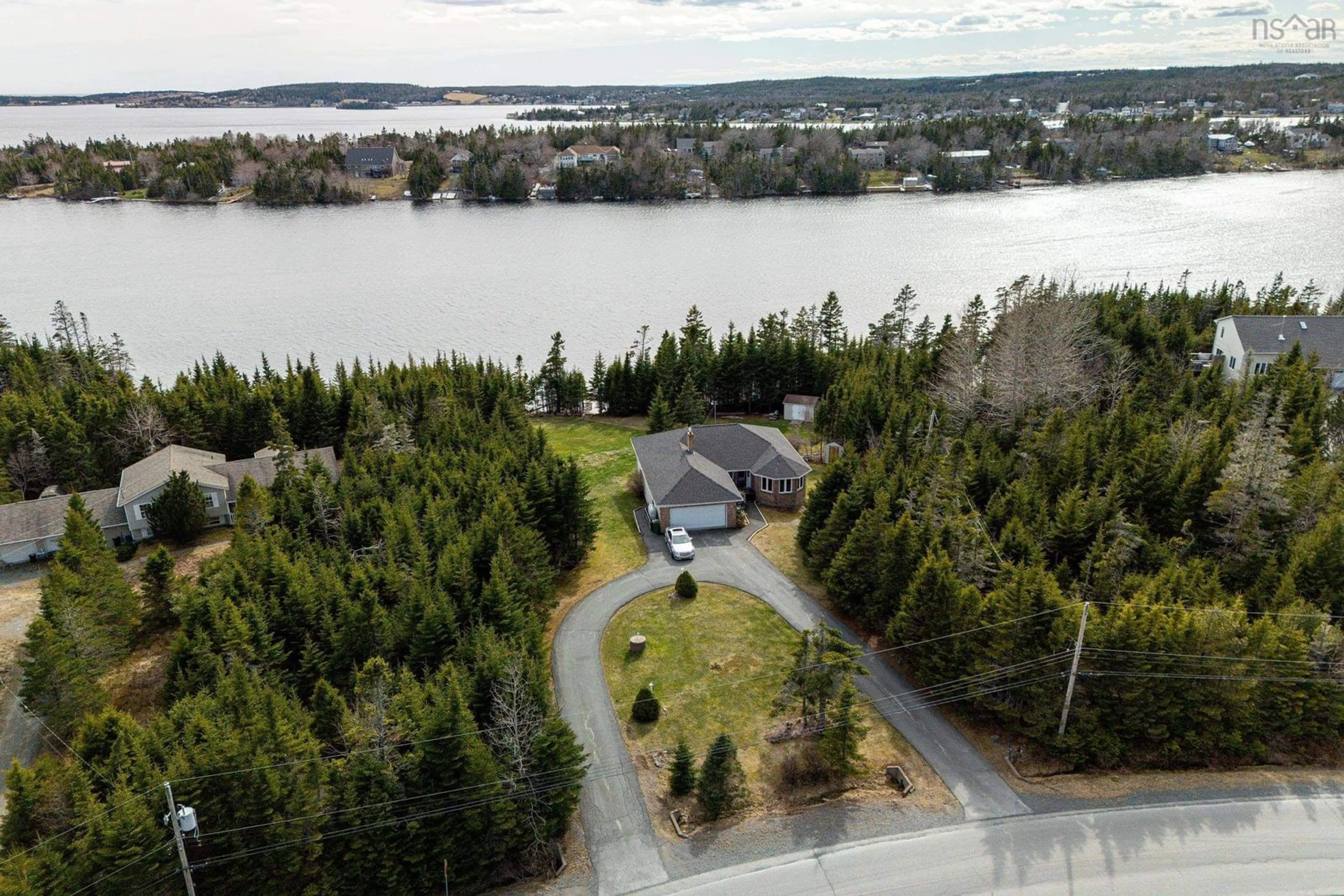 A pic from outside/outdoor area/front of a property/back of a property/a pic from drone, water/lake/river/ocean view for 287 Greenough Dr, West Porters Lake Nova Scotia B3E 1M8