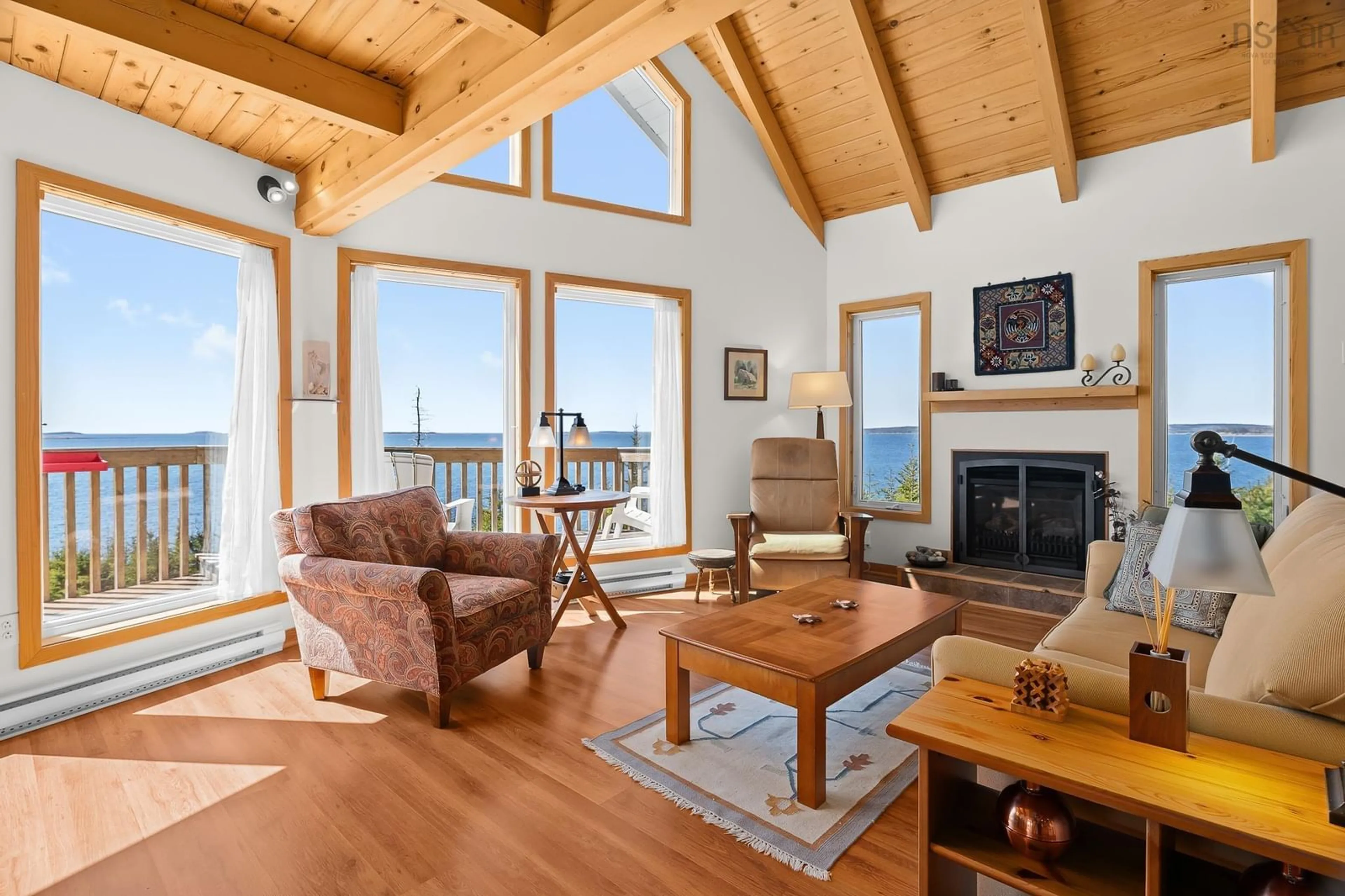 Living room with furniture, wood/laminate floor for 240 Beaver Dr, West Quoddy Nova Scotia B0J 2R0