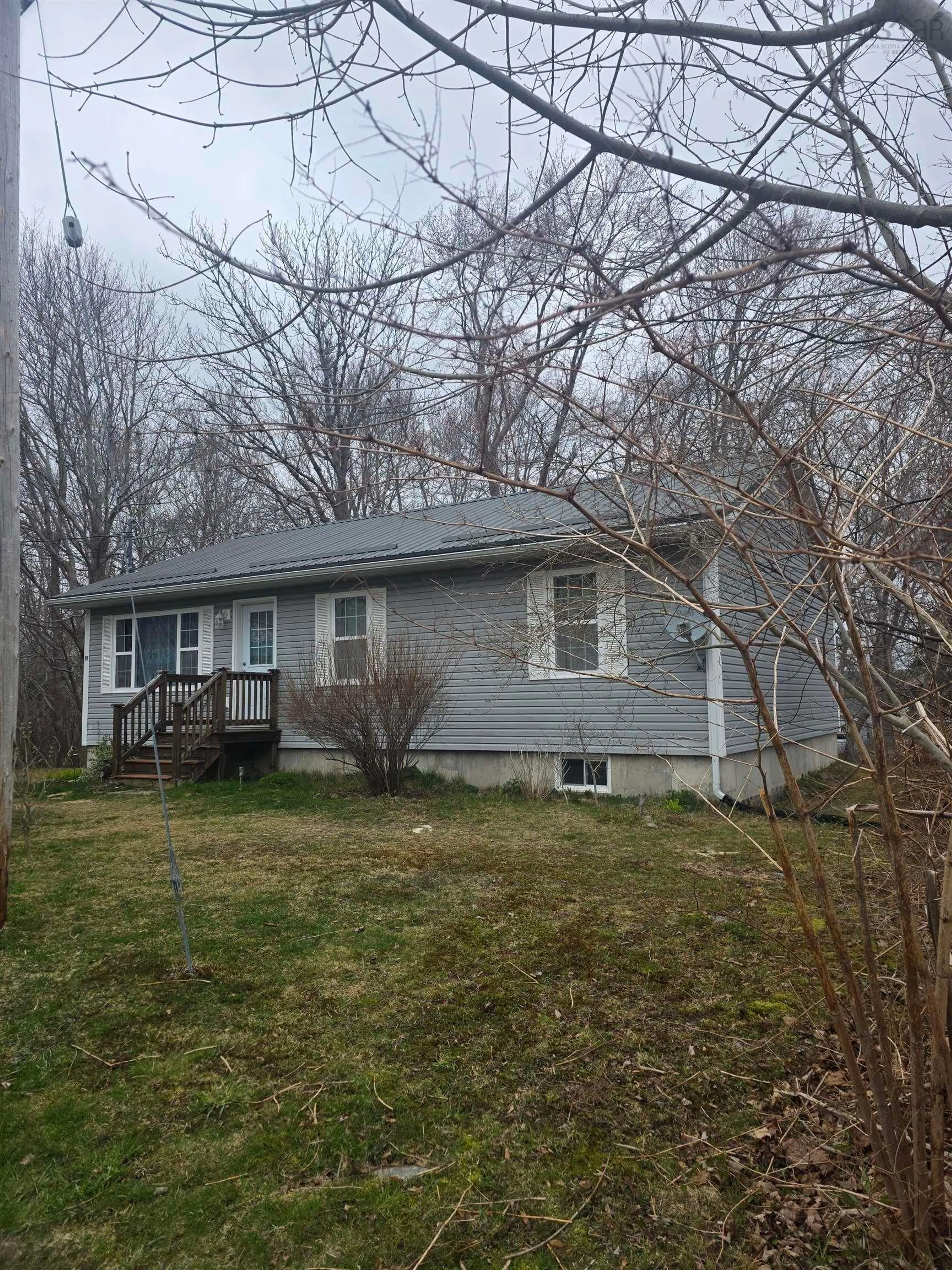 Home with vinyl exterior material, street for 14 Lawrence Street, Liverpool Nova Scotia B0T 1K0
